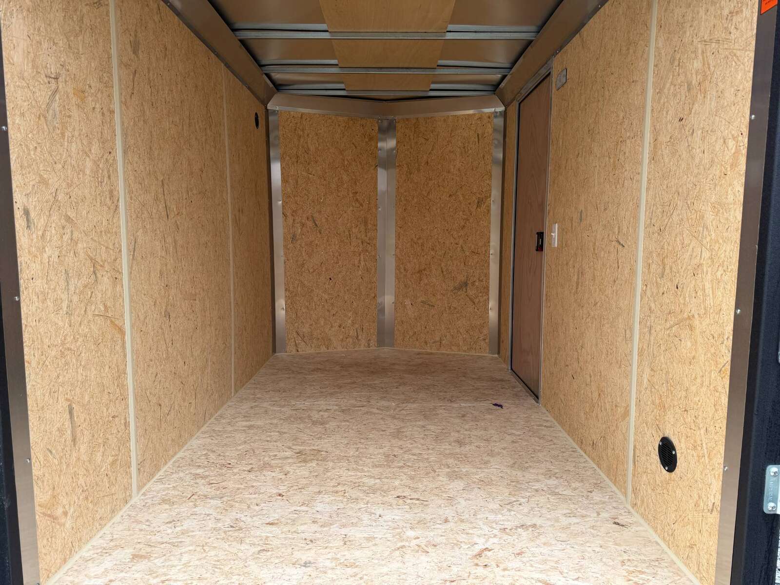 Photo of 2026 Impact Quake 6x10 V Nose Cargo / Enclosed Trailer Black Ramp Door Extra Height 2990lb GVW