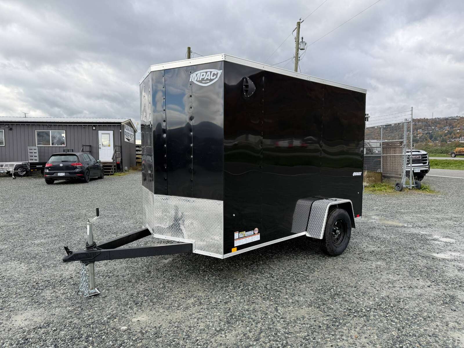 Photo of 2026 Impact Quake 6x10 V Nose Cargo / Enclosed Trailer Black Ramp Door Extra Height 2990lb GVW
