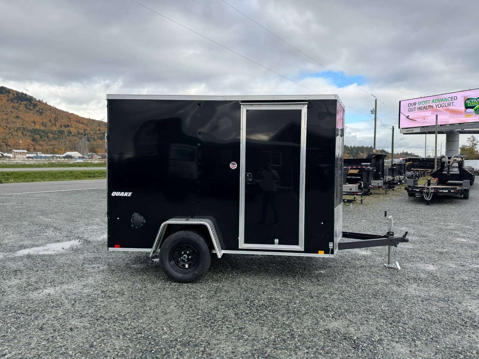 Photo of 2026 Impact Quake 6x10 V Nose Cargo / Enclosed Trailer Black Ramp Door Extra Height 2990lb GVW