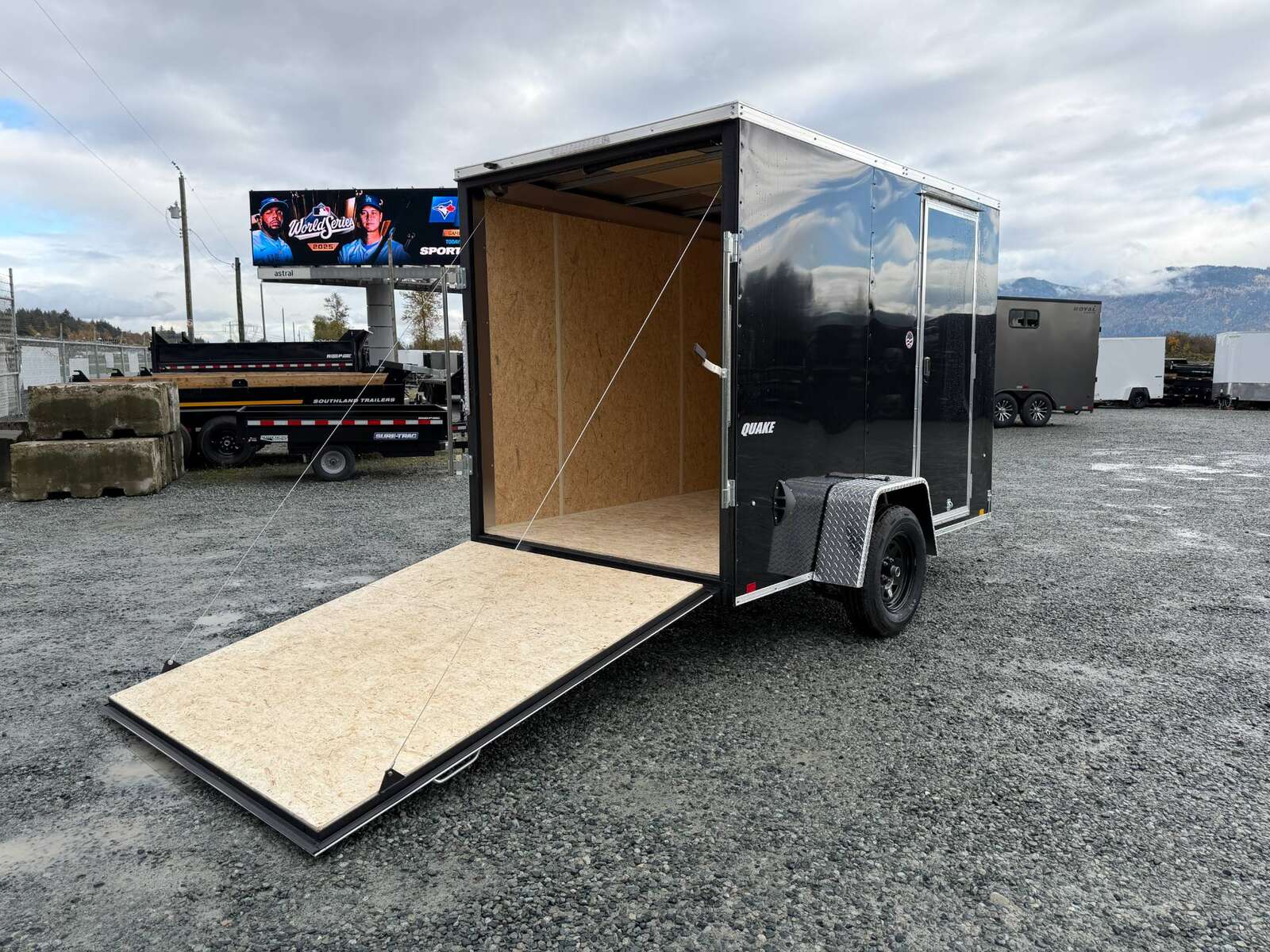 Photo of 2026 Impact Quake 6x10 V Nose Cargo / Enclosed Trailer Black Ramp Door Extra Height 2990lb GVW