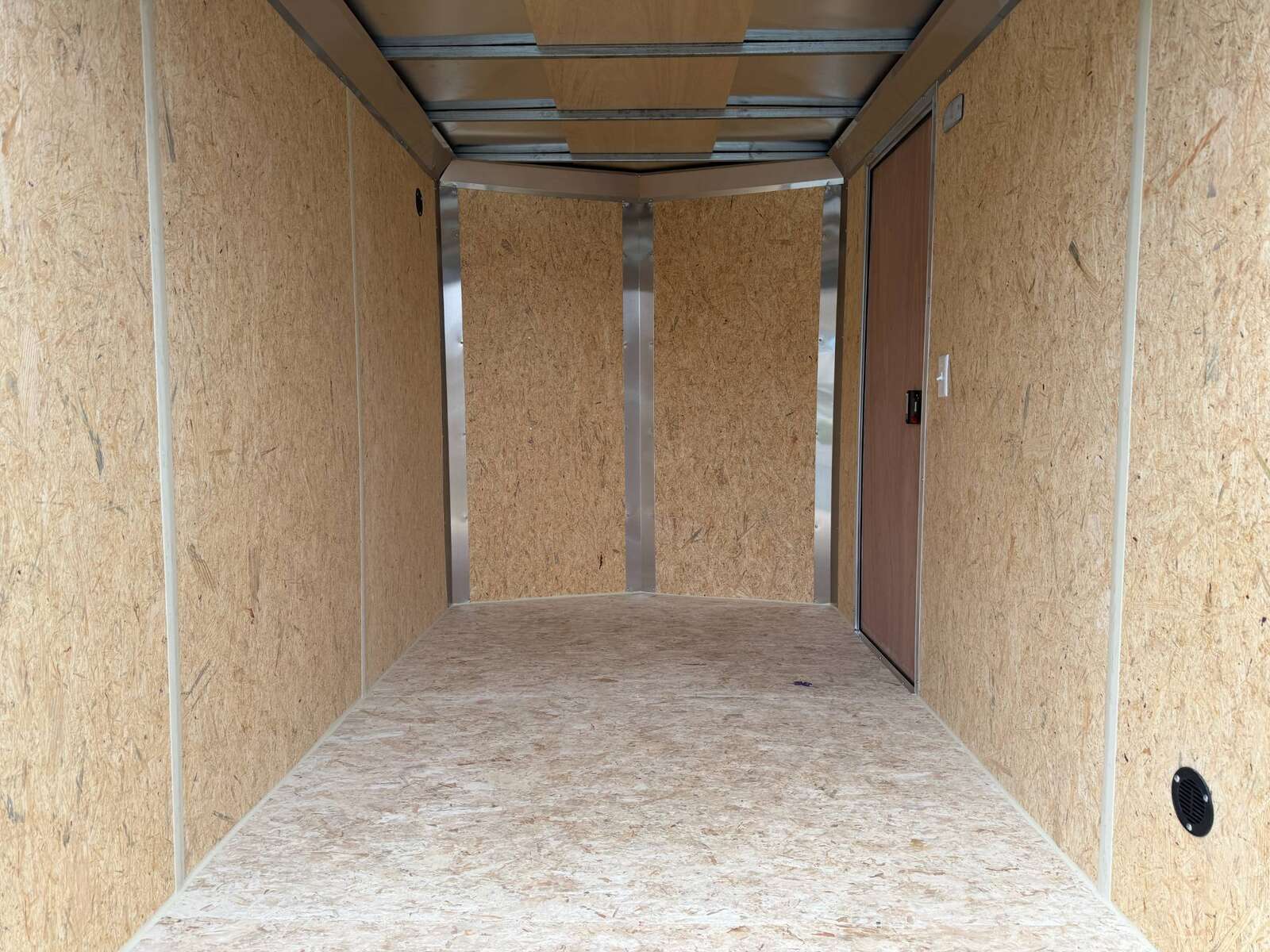 Photo of 2026 Impact Quake 6x10 V Nose Cargo / Enclosed Trailer White Barn Doors Extra Height 2990lb GVW