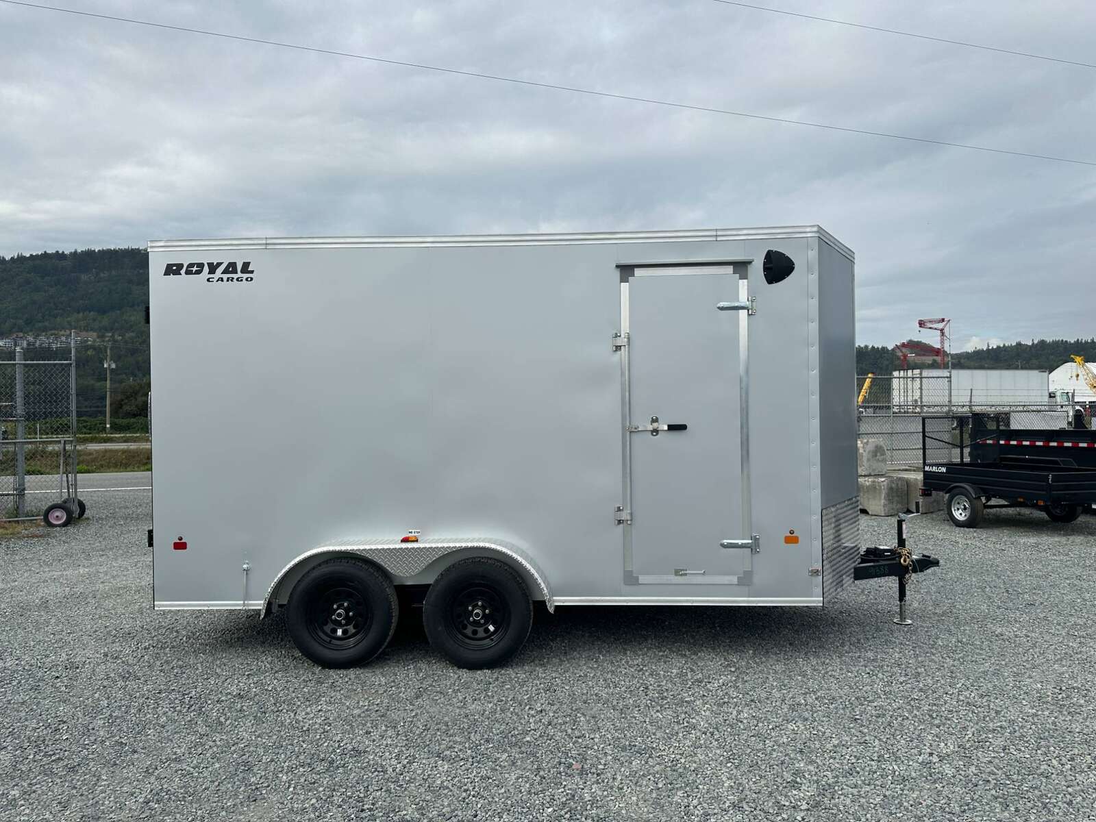 Photo of 2026 Royal Cargo 7X14 V Nose 7700LB GVW BARN DOORS Enclosed Trailer Extra Tall SILVER