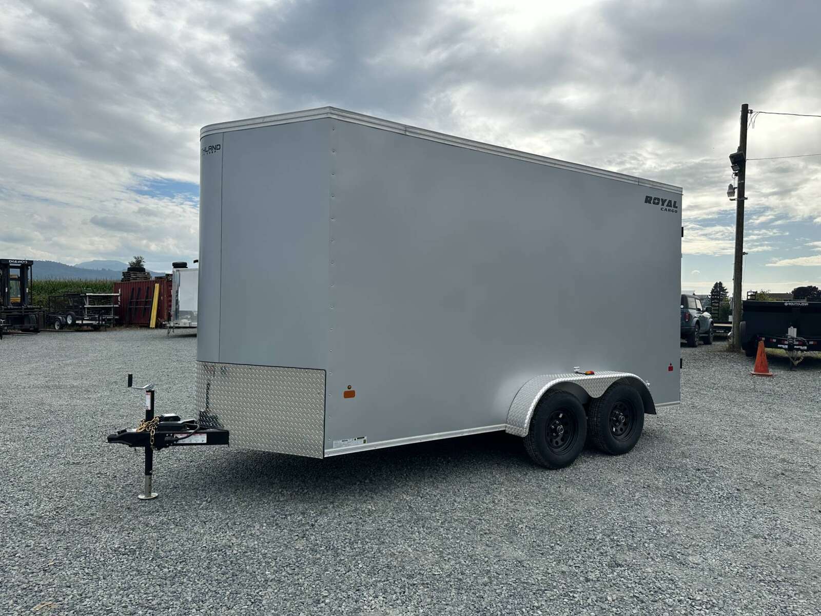 Photo of 2026 Royal Cargo 7X14 V Nose 7700LB GVW BARN DOORS Enclosed Trailer Extra Tall SILVER