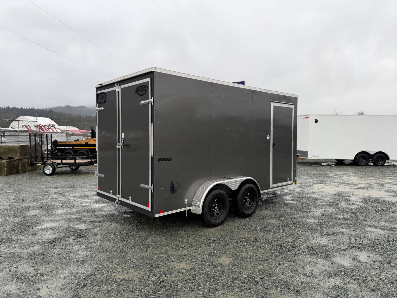 Photo of 2026 Impact 7x14 Quake V Nose Cargo Enclosed Trailer Barn Doors Extra Height Charcoal Grey 7000lb GVW