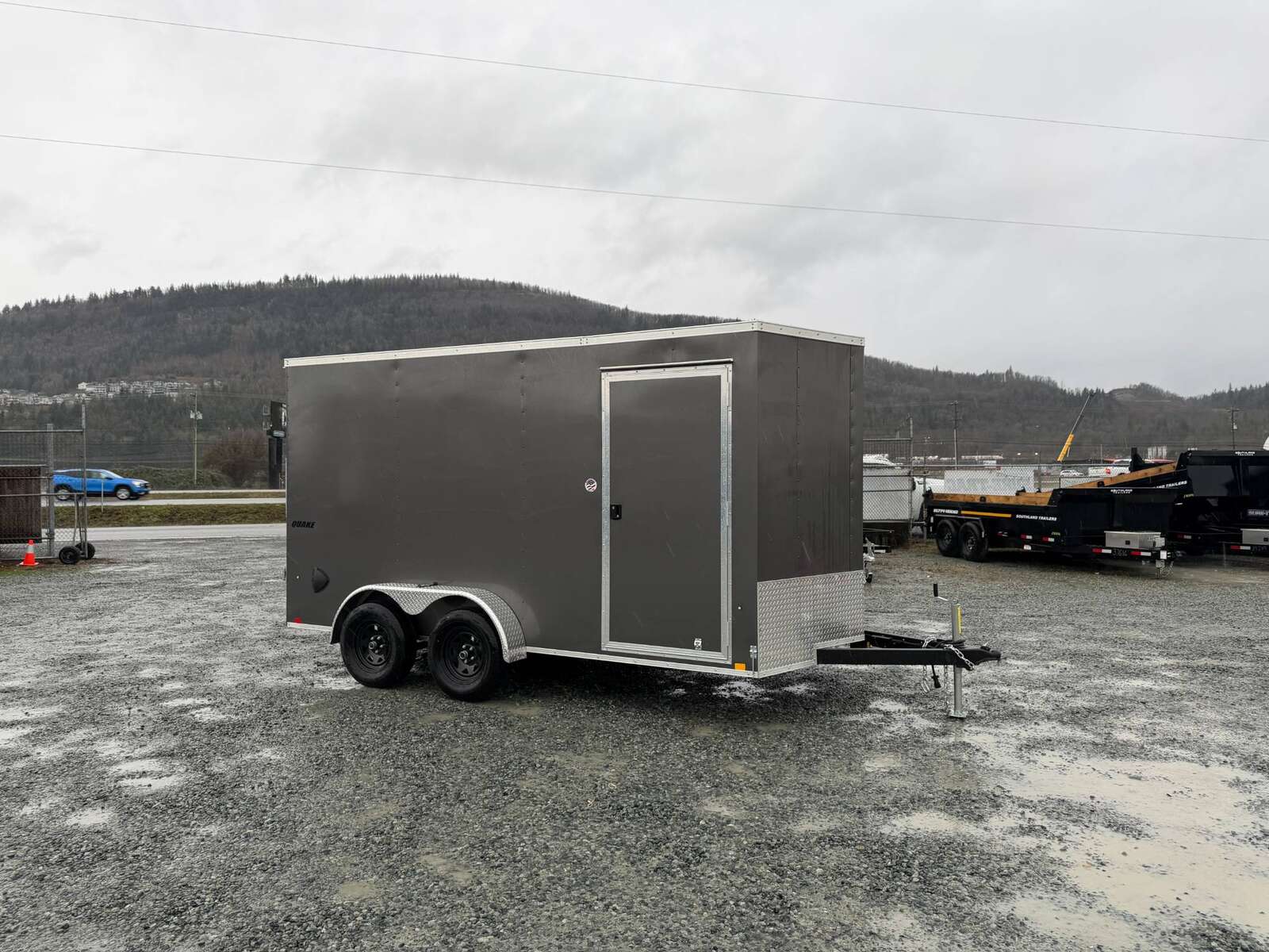 Photo of 2026 Impact 7x14 Quake V Nose Cargo Enclosed Trailer Barn Doors Extra Height Charcoal Grey 7000lb GVW