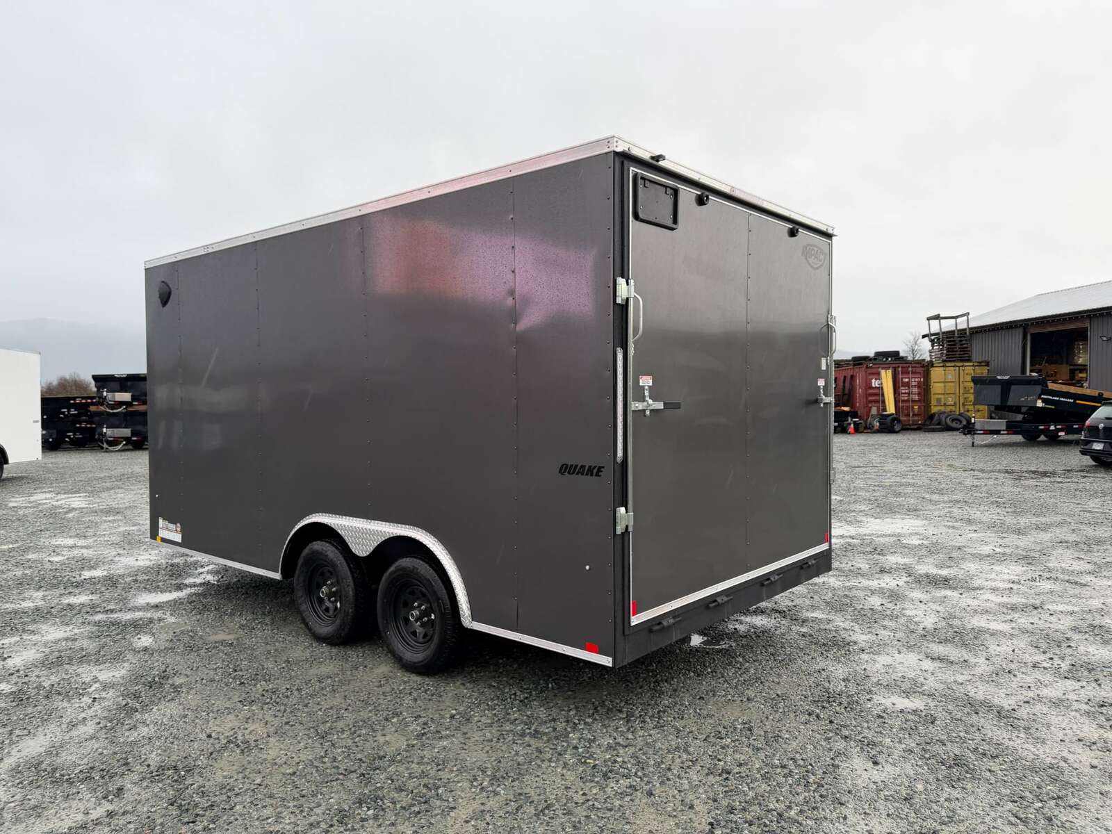 Photo of 2026 Impact 8.5x16 Quake V Nose Cargo Enclosed Trailer Ramp Door Extra Height Charcoal Grey 7000lb GVW