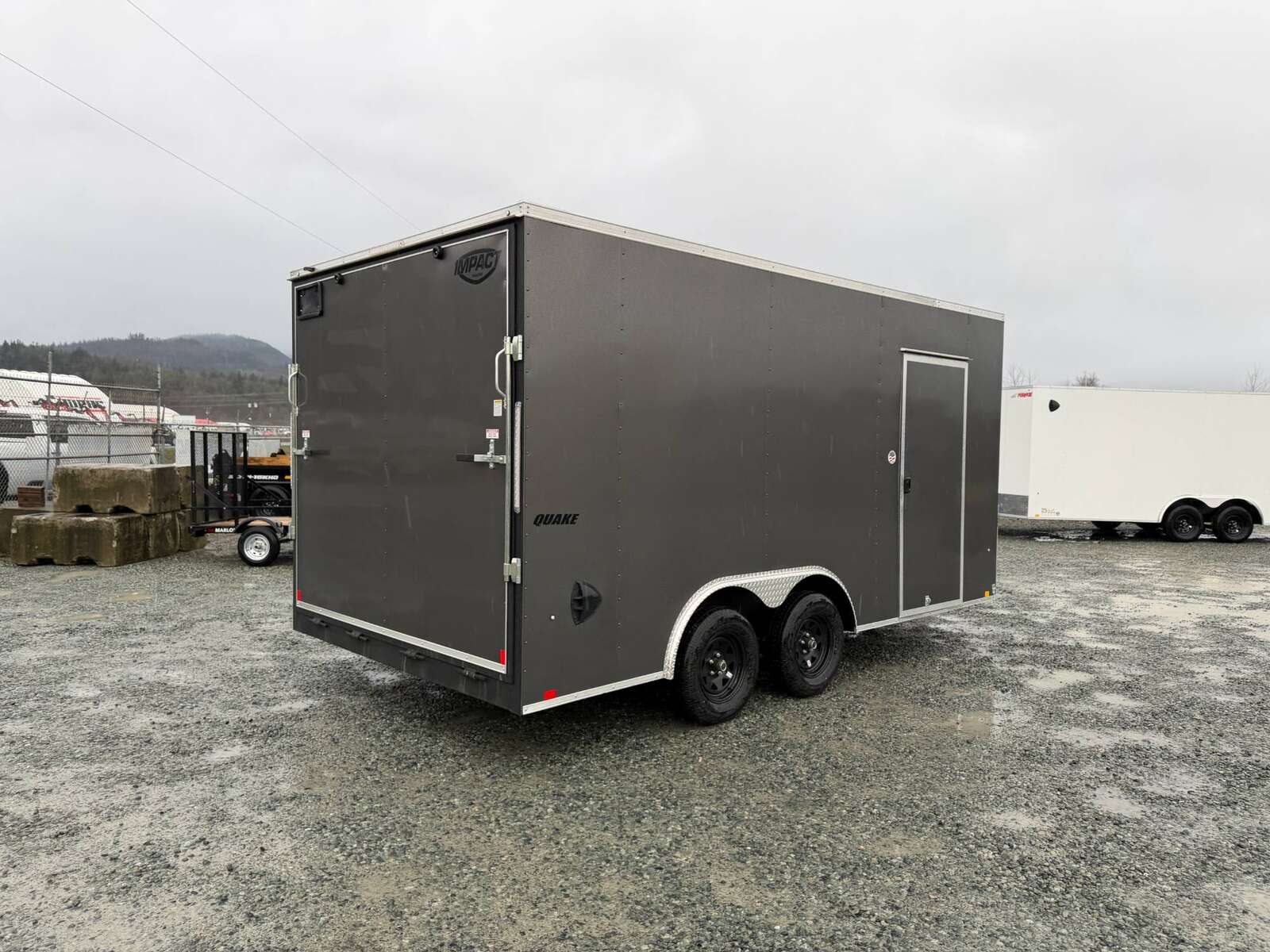 Photo of 2026 Impact 8.5x16 Quake V Nose Cargo Enclosed Trailer Ramp Door Extra Height Charcoal Grey 7000lb GVW