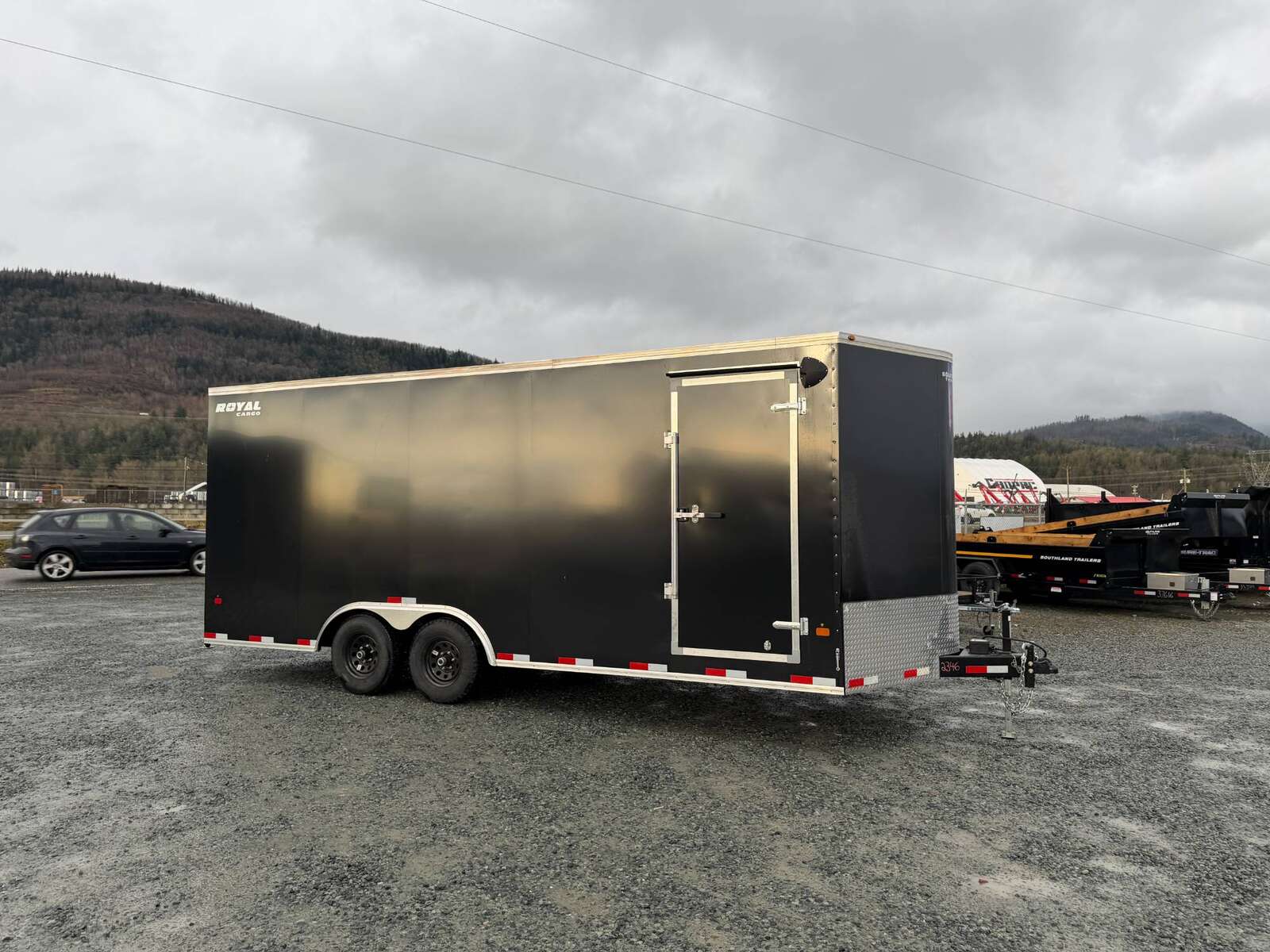 Photo of **DISCOUNT SPECIAL - MISMATCH SIDE PANEL** 2026 Royal Cargo 8.5x20 +V Nose 11,400lb Cargo / Enclosed Trailer Car Hauler Extra Height Ramp Door Black