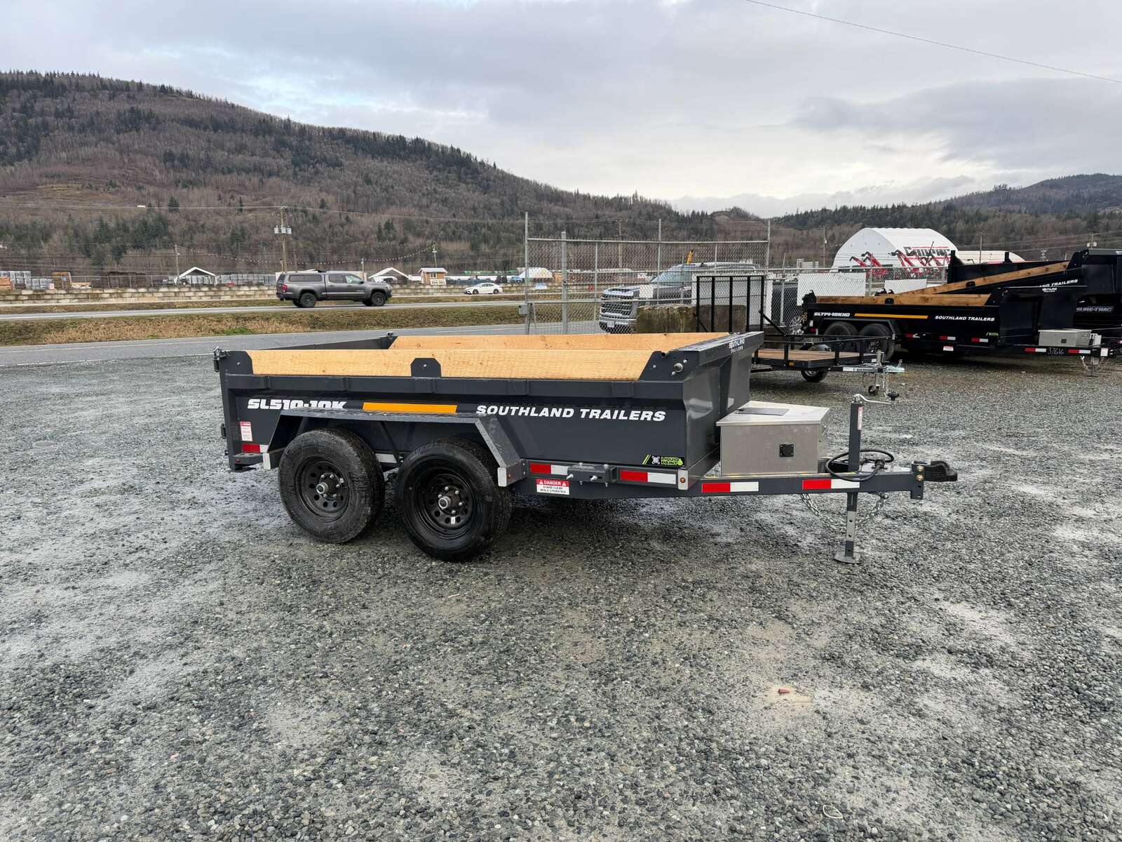 Photo of 2026 Southland 5x10 Dump Trailer 11,464lbs GVW Charcoal Grey w/ Tarp & Ramps