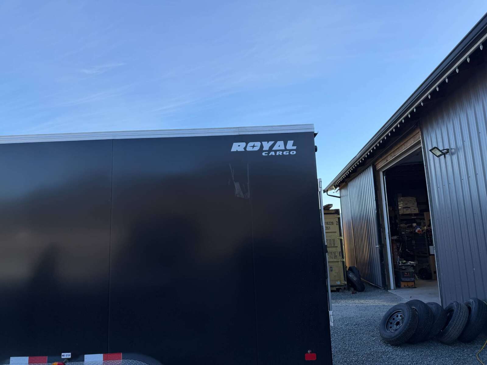 Photo of **SALE STAINED SIDE PANEL** 2026 Royal 7.5x18 Cargo Enclosed Trailer Heavy Duty 11400lb GVW w/ Ramp Door Black