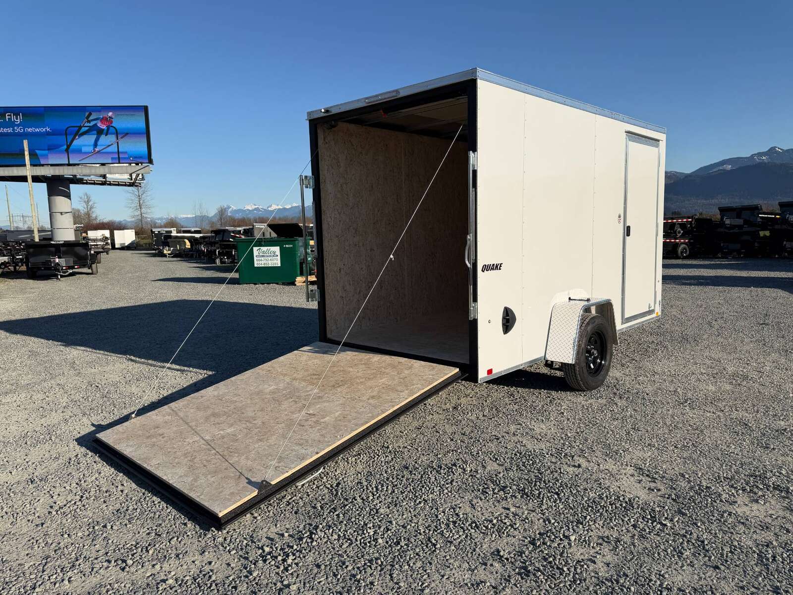 Photo of 2026 Impact Quake 6x12 V Nose Cargo / Enclosed Trailer White Ramp Door Extra Height 2990lb GVW