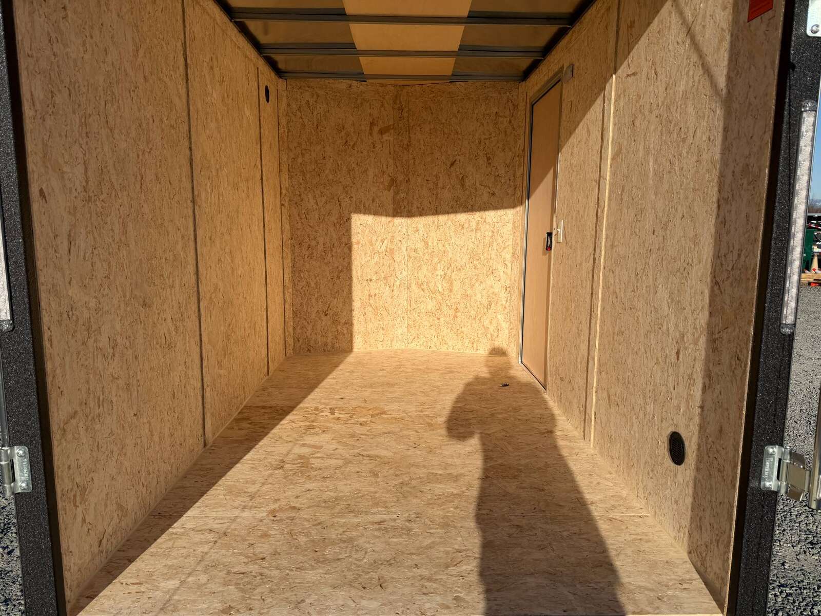 Photo of 2026 Impact Quake 6x10 V Nose Cargo / Enclosed Trailer Charcoal Grey Ramp Door Extra Height 2990lb GVW