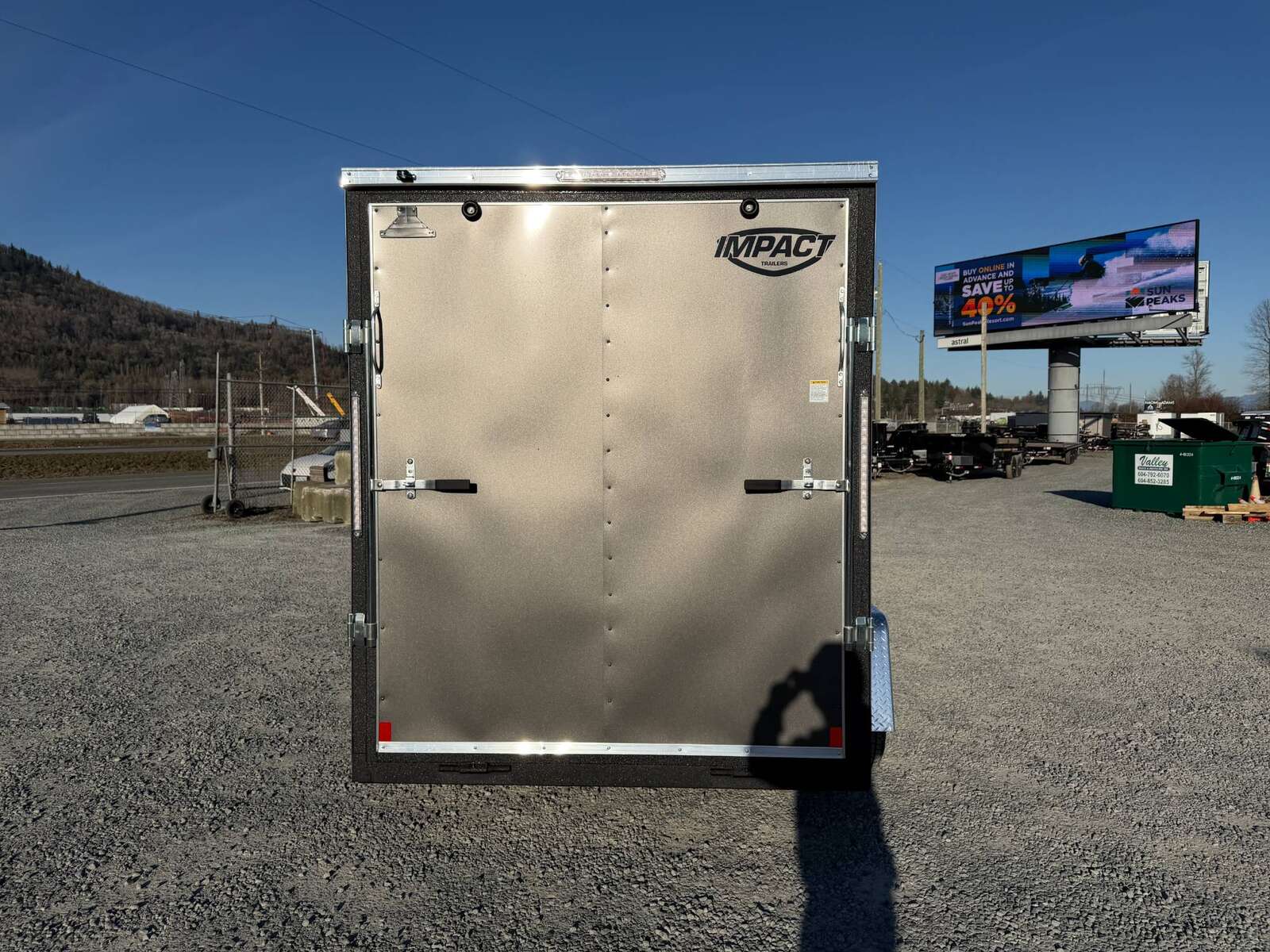 Photo of 2026 Impact Quake 6x10 V Nose Cargo / Enclosed Trailer Charcoal Grey Ramp Door Extra Height 2990lb GVW