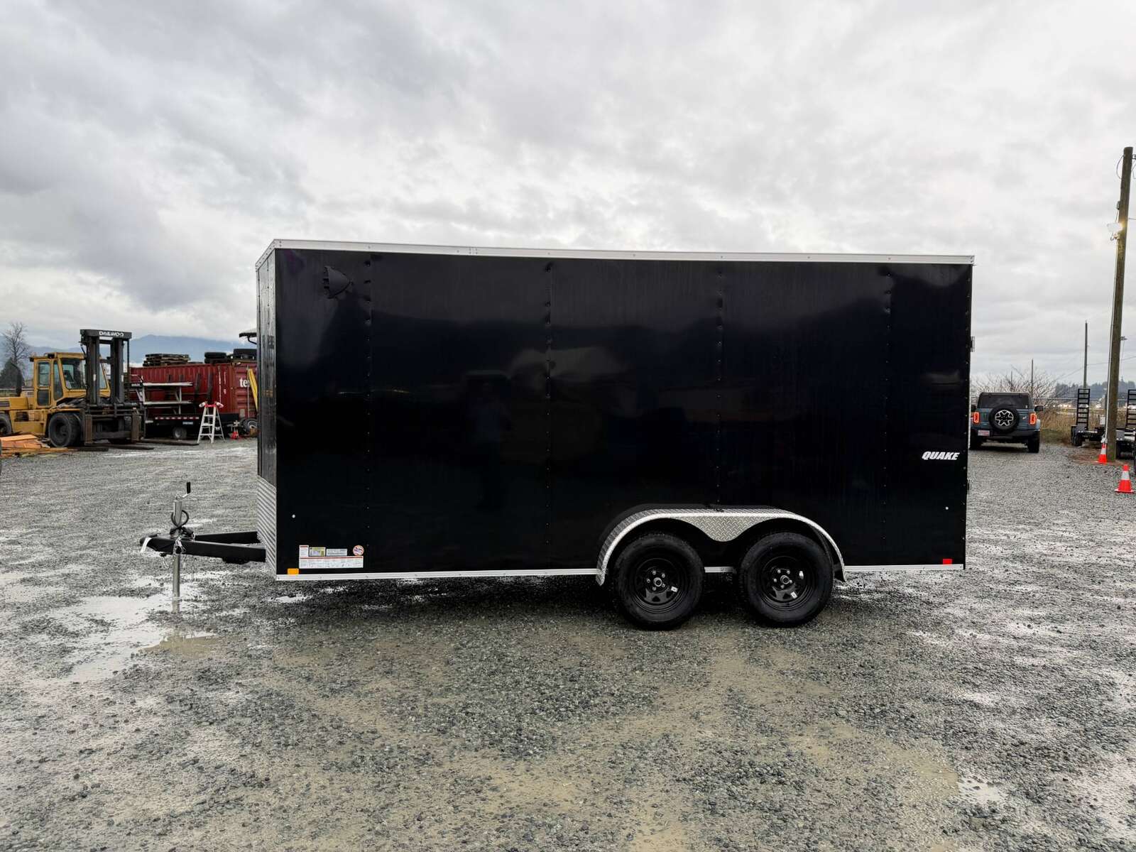 Photo of 2026 Impact Quake 7X16 V-Nose Ramp Door Cargo / Enclosed Trailer Extra Height Black 7000lb GVW