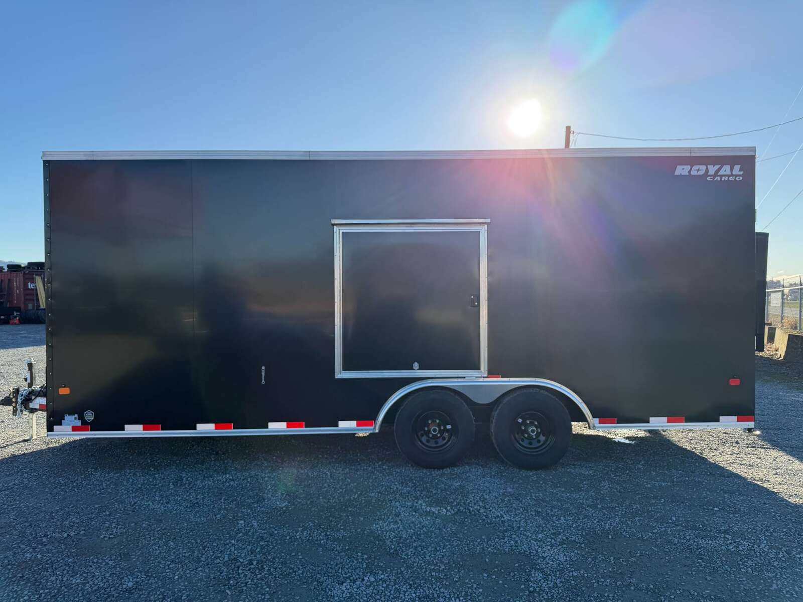 Photo of **DENT SPECIAL** 2026 Royal Cargo 8.5x20 SIDE ESCAPE DOOR +V Nose 11,400lb Cargo / Enclosed Trailer Car Hauler Extra Height Ramp Door Black