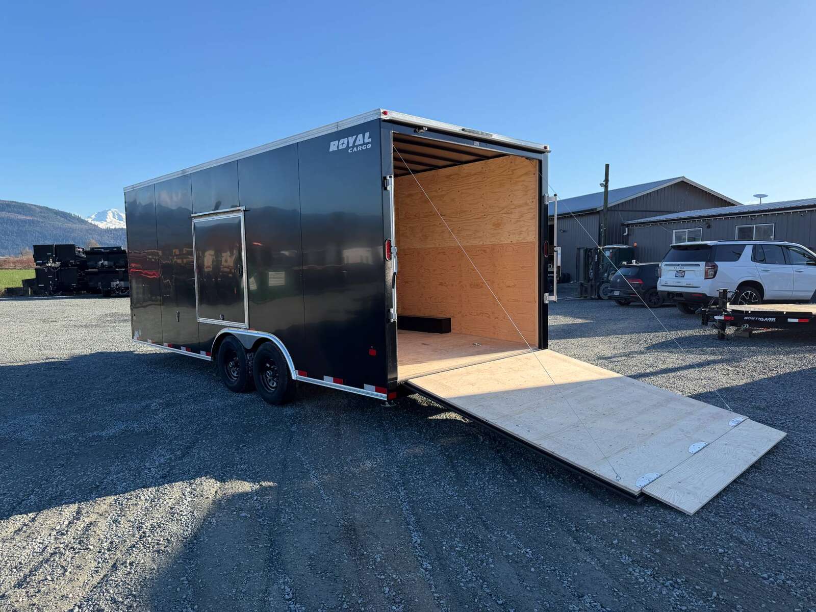 Photo of **DENT SPECIAL** 2026 Royal Cargo 8.5x20 SIDE ESCAPE DOOR +V Nose 11,400lb Cargo / Enclosed Trailer Car Hauler Extra Height Ramp Door Black