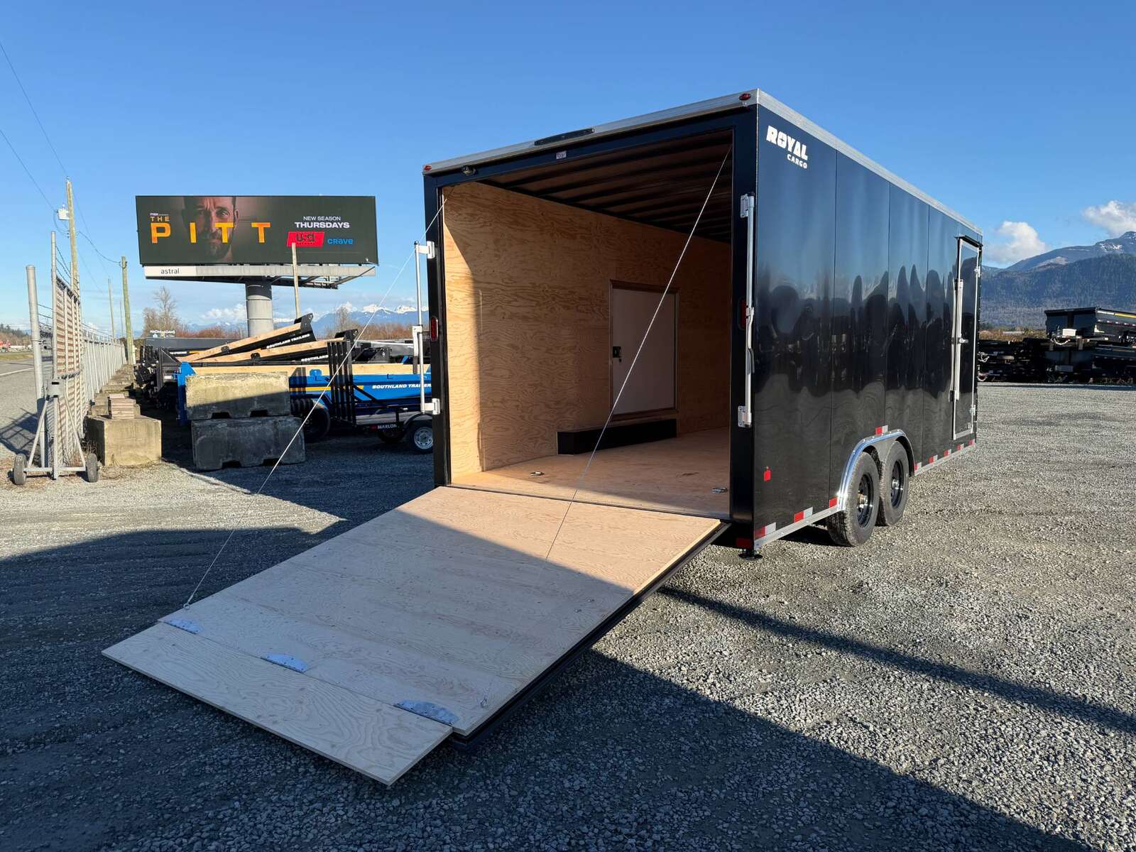 Photo of **DENT SPECIAL** 2026 Royal Cargo 8.5x20 SIDE ESCAPE DOOR +V Nose 11,400lb Cargo / Enclosed Trailer Car Hauler Extra Height Ramp Door Black