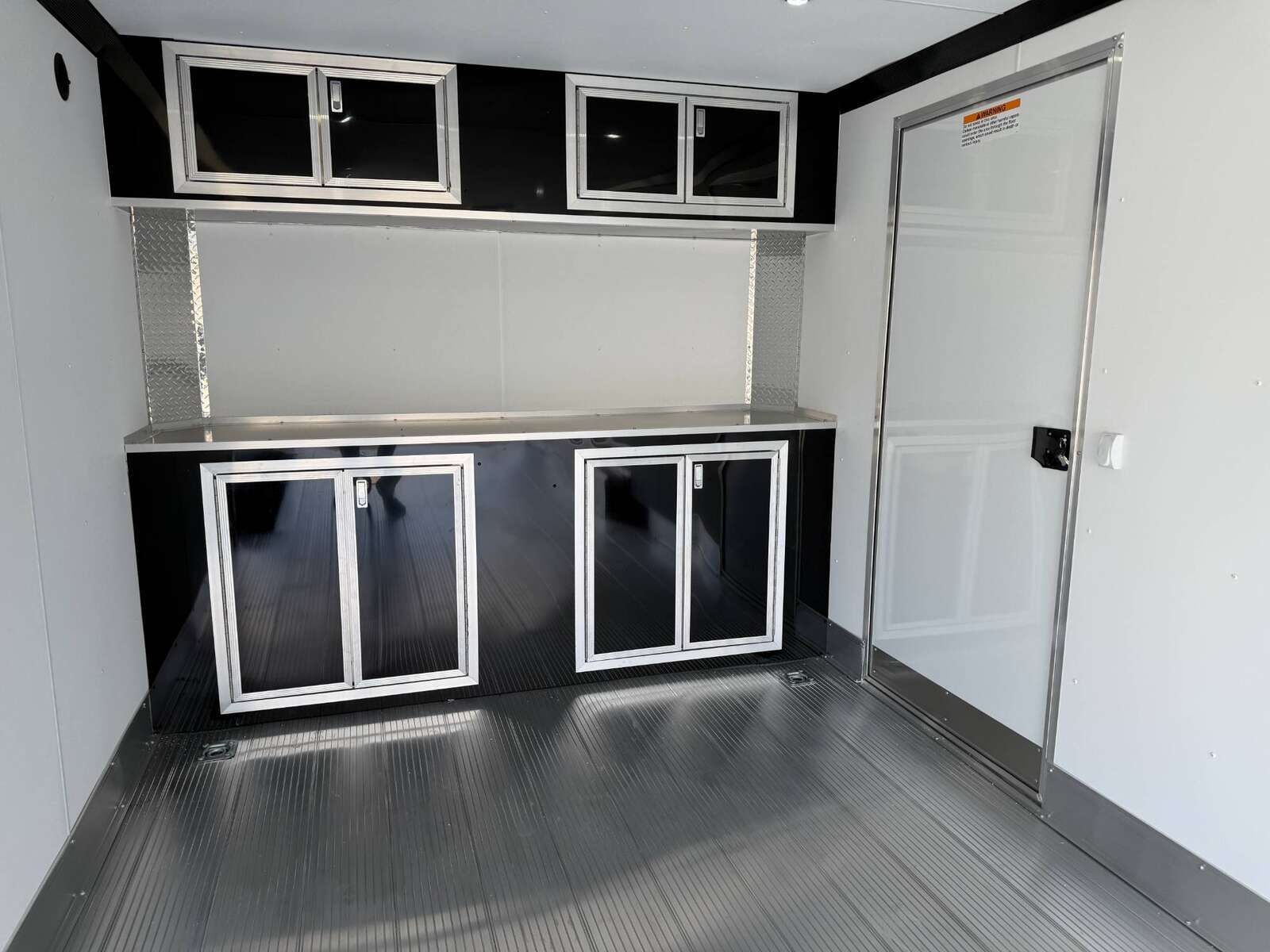 Photo of 2026 ALCOM ALUMINUM 8.5x24 CAR HAULER TRAILER 9900lb GVW WHITE LARGE ESCAPE SIDE DOOR CARGO ENCLOSED