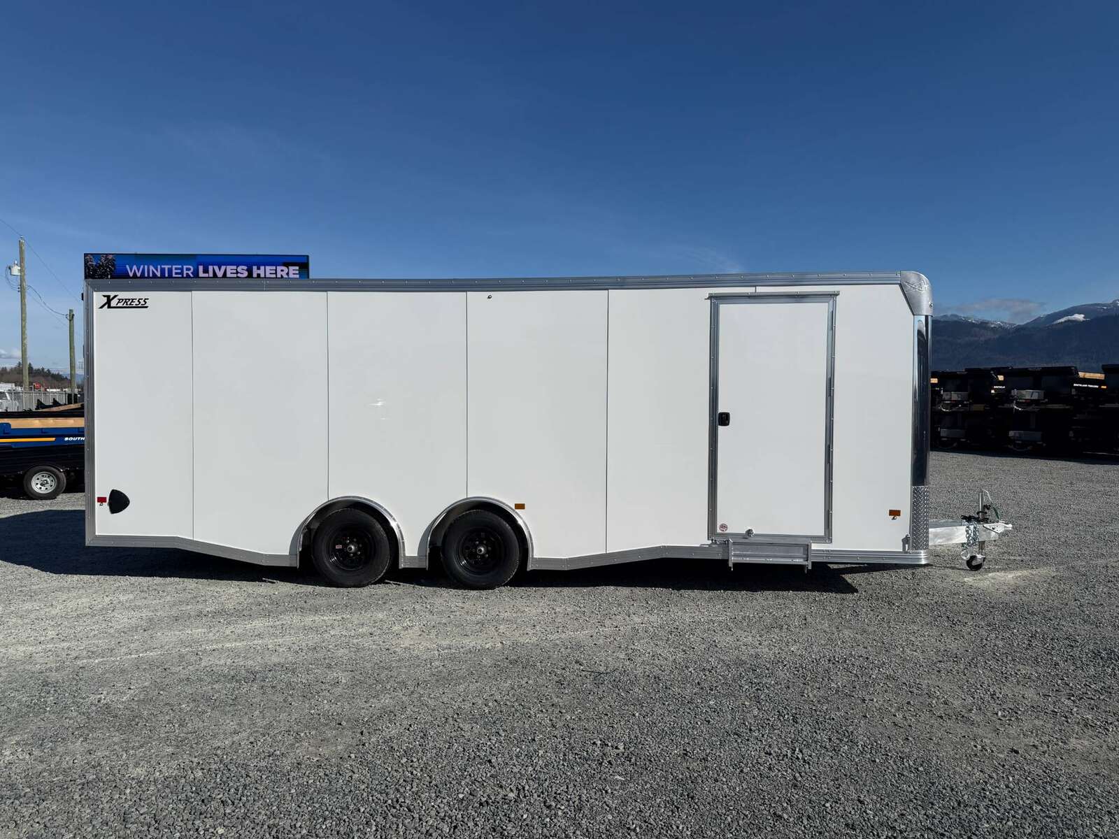 Photo of 2026 ALCOM ALUMINUM 8.5x24 CAR HAULER TRAILER 9900lb GVW WHITE LARGE ESCAPE SIDE DOOR CARGO ENCLOSED