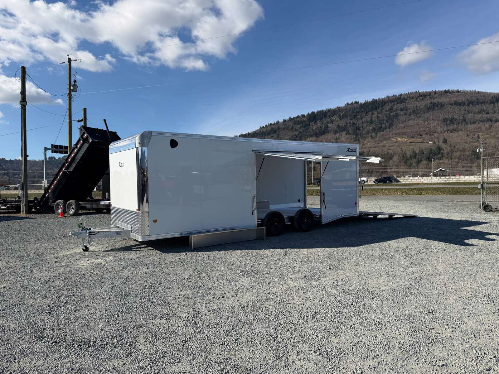 Photo of 2026 ALCOM ALUMINUM 8.5x24 CAR HAULER TRAILER 9900lb GVW WHITE LARGE ESCAPE SIDE DOOR CARGO ENCLOSED