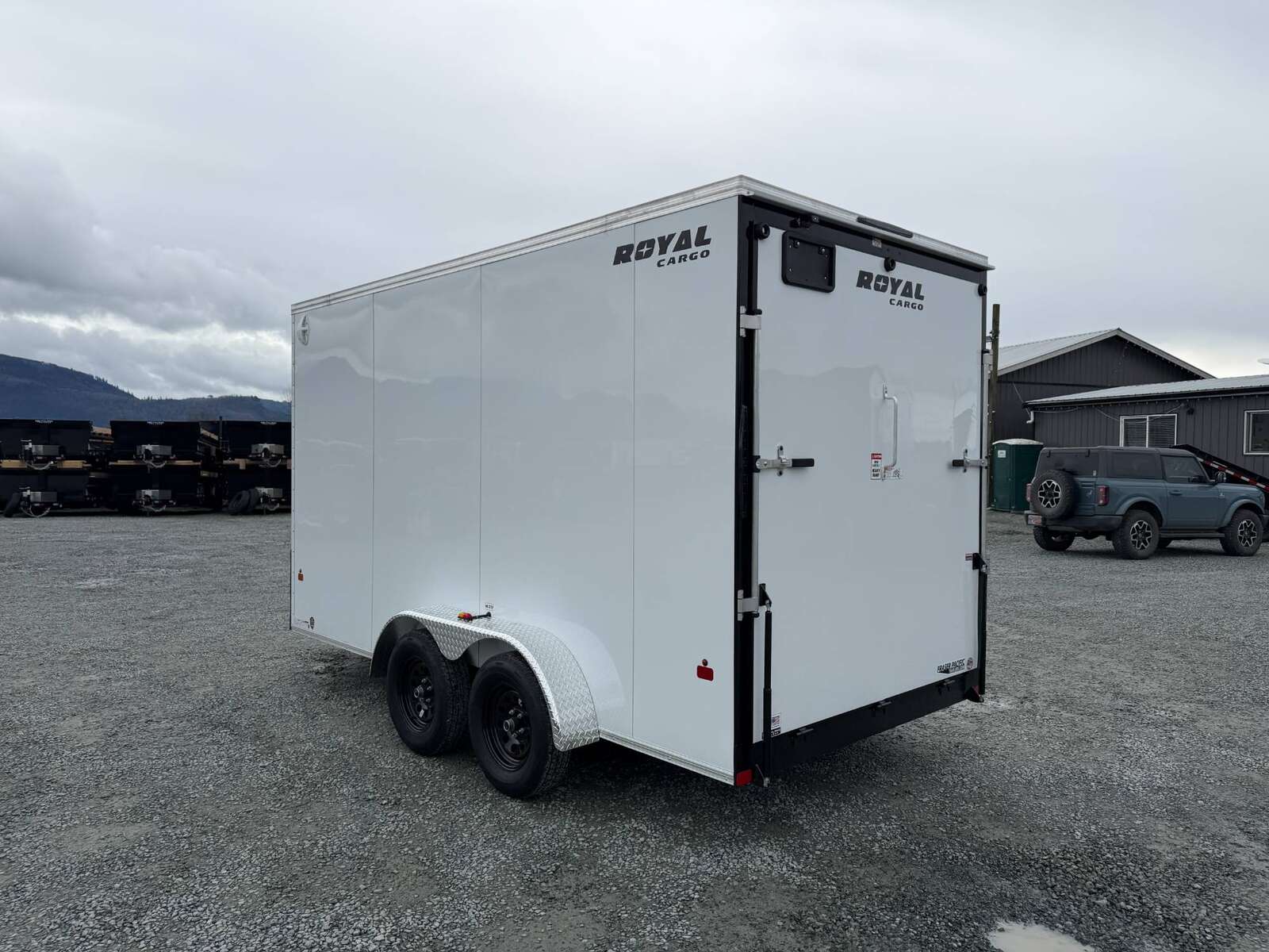 Photo of 2026 Royal Cargo 7X14 V Nose 7700LB GVW RAMP DOOR White Enclosed Cargo Trailer Extra Tall (GSR)