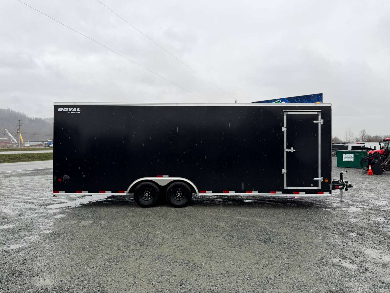 Photo of 2026 Royal Cargo 8.5x24 V Nose Car Hauler Cargo / Enclosed Trailer w/ Side Escape Door 11,400lb GVW Satin Black Ramp Door Extra Height