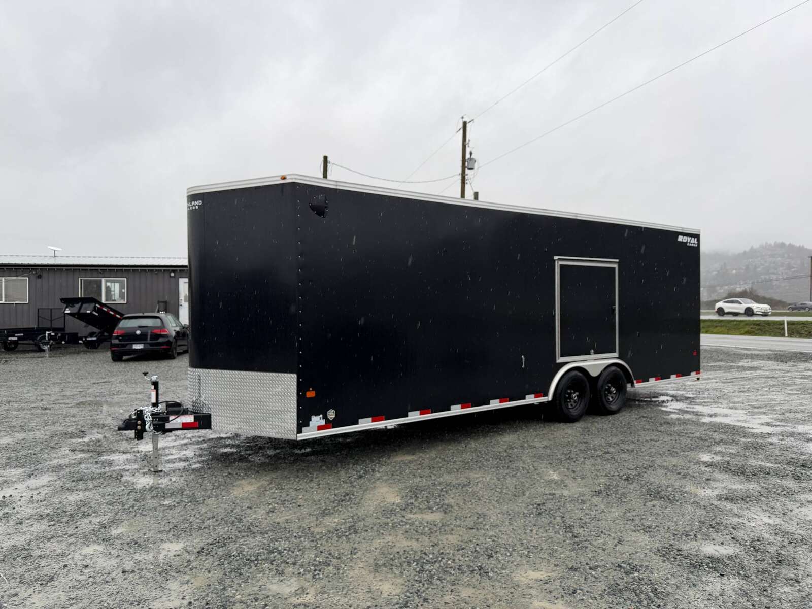 Photo of 2026 Royal Cargo 8.5x24 V Nose Car Hauler Cargo / Enclosed Trailer w/ Side Escape Door 11,400lb GVW Satin Black Ramp Door Extra Height
