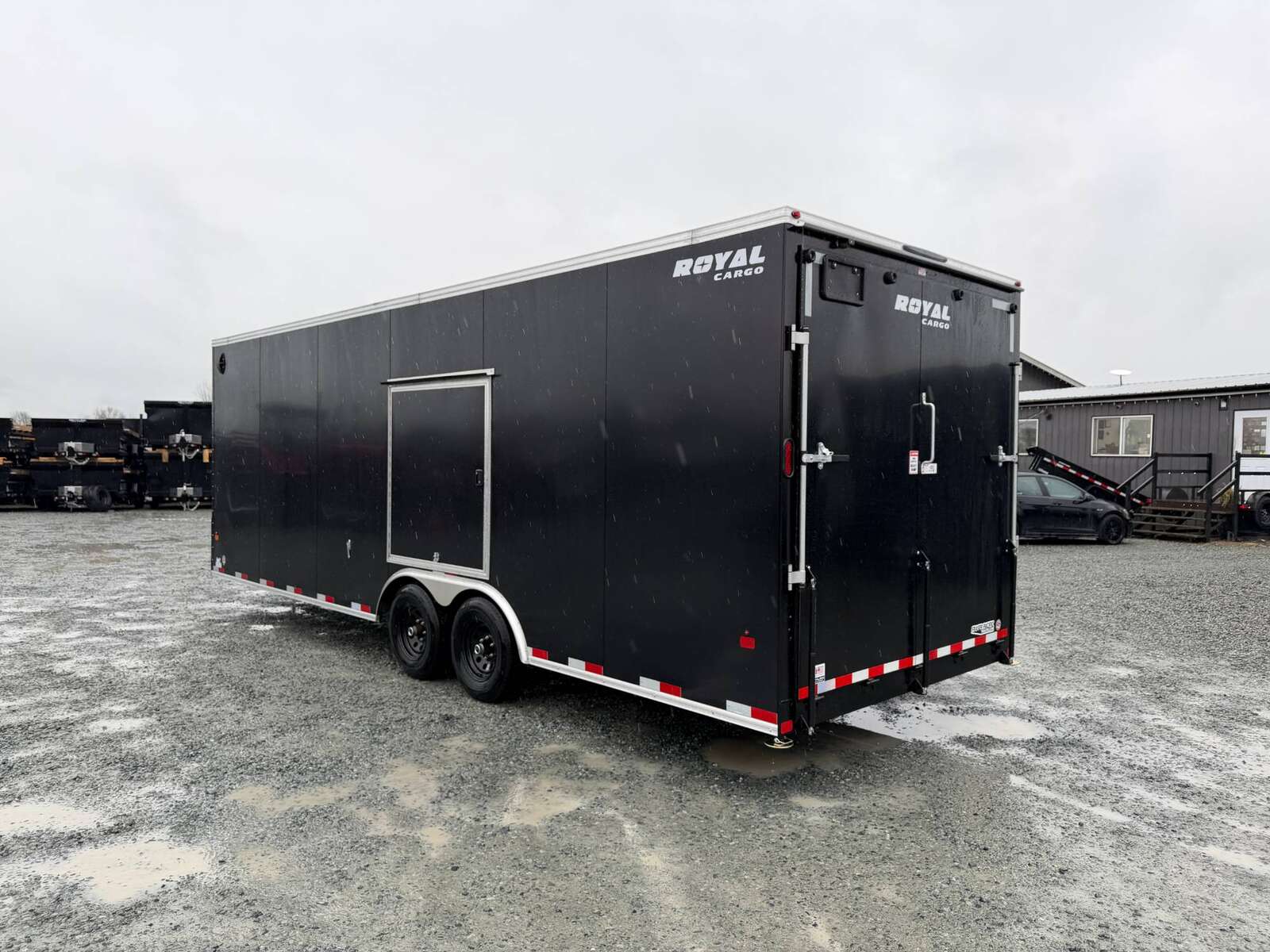 Photo of 2026 Royal Cargo 8.5x24 V Nose Car Hauler Cargo / Enclosed Trailer w/ Side Escape Door 11,400lb GVW Satin Black Ramp Door Extra Height