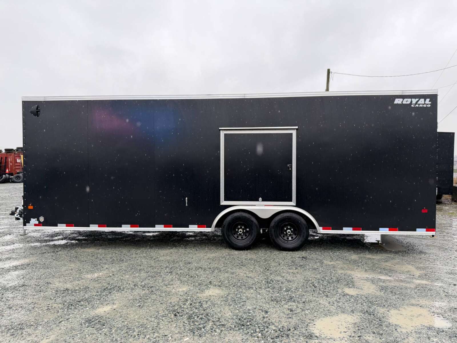 Photo of 2026 Royal Cargo 8.5x24 V Nose Car Hauler Cargo / Enclosed Trailer w/ Side Escape Door 11,400lb GVW Satin Black Ramp Door Extra Height