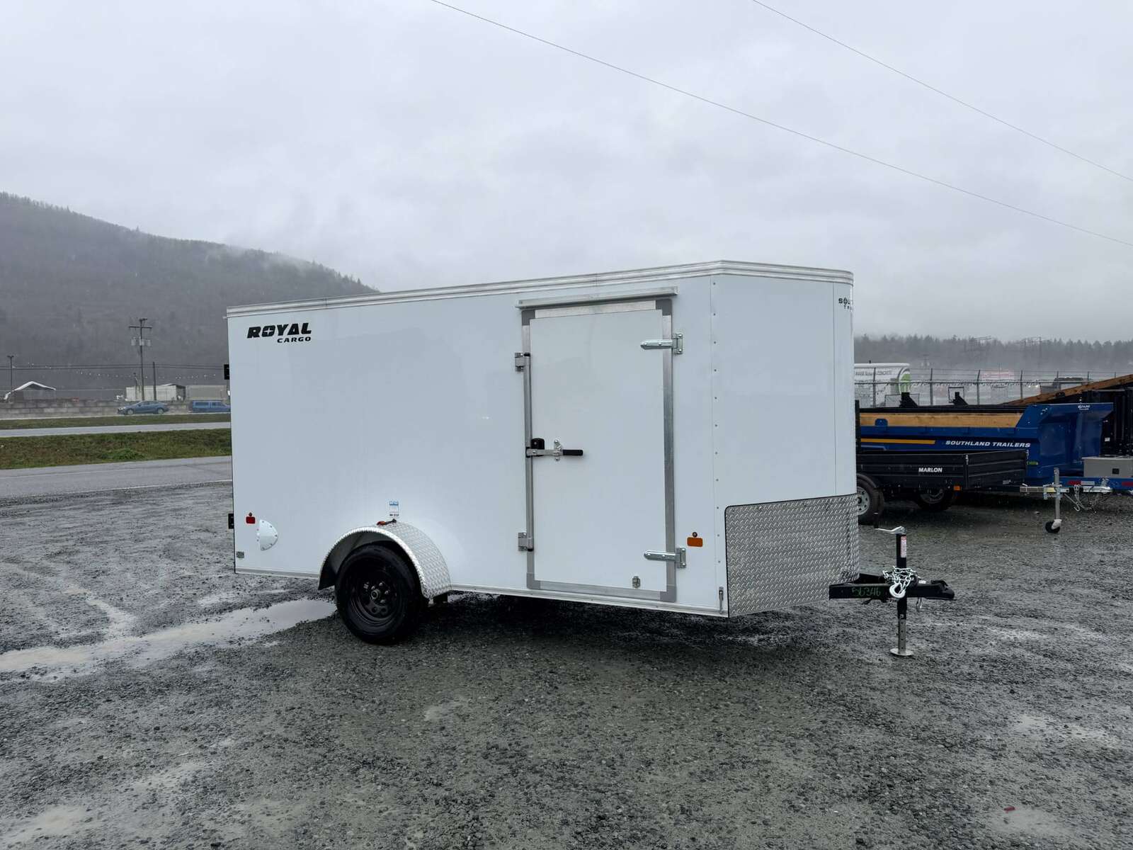 Photo of 2026 Royal Cargo 6x12 V Nose Cargo / Enclosed Trailer Barn Doors White