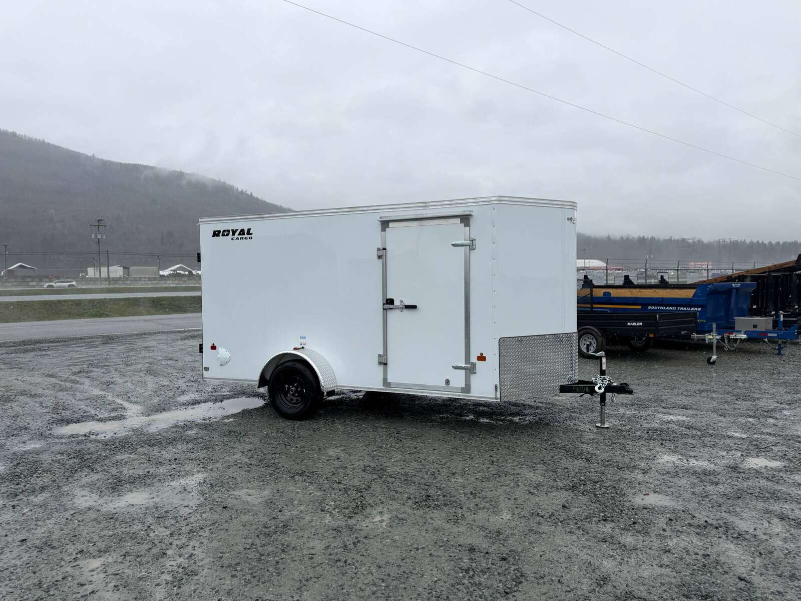 Photo of 2026 Royal Cargo 6x12 V Nose Cargo / Enclosed Trailer Barn Doors White