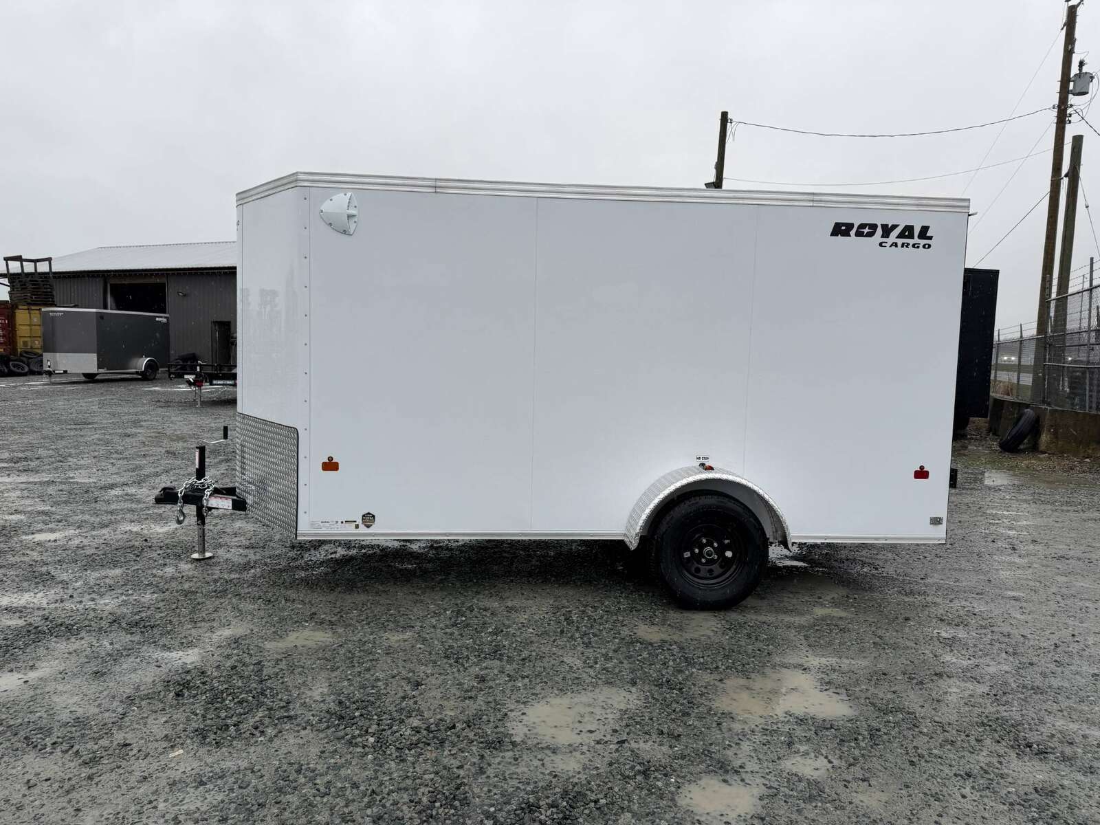 Photo of 2026 Royal Cargo 6x12 V Nose Cargo / Enclosed Trailer Barn Doors White