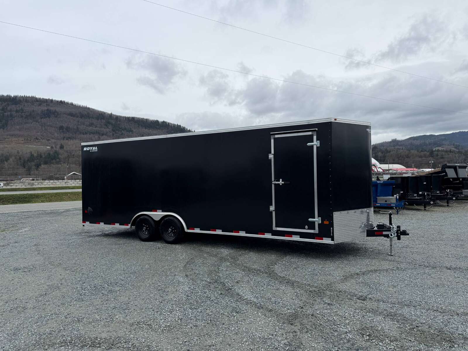Photo of 2026 Royal Cargo 8.5x24 V Nose Car Hauler Cargo / Enclosed Trailer 11,400lb GVW Satin Black Ramp Door Extra Height (GSR)