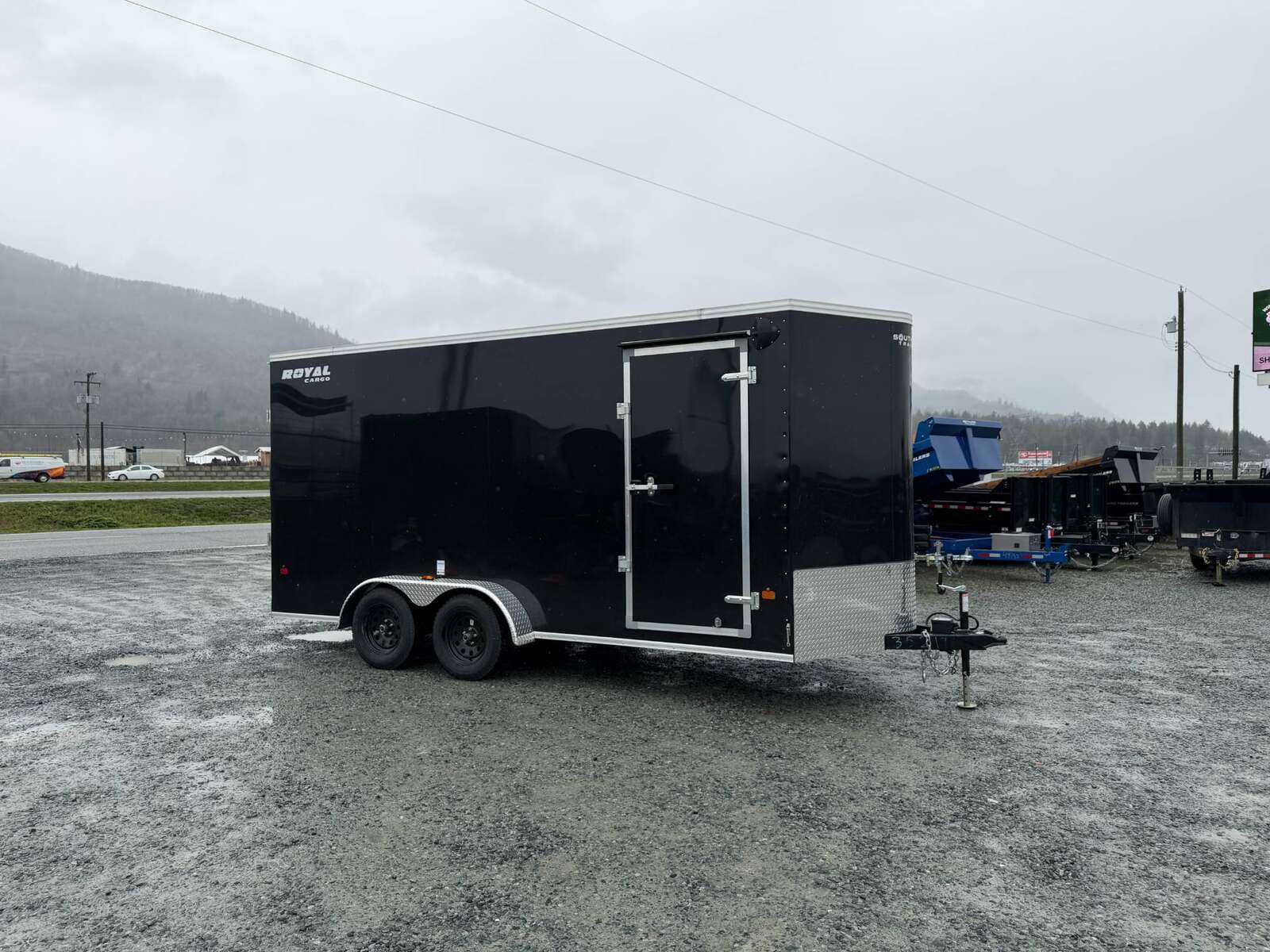 Photo of Pre Owned Used 2026 Royal 7x16 Enclosed Cargo Trailer V Nose Ramp Door Black 7700lb GVW Extra Height