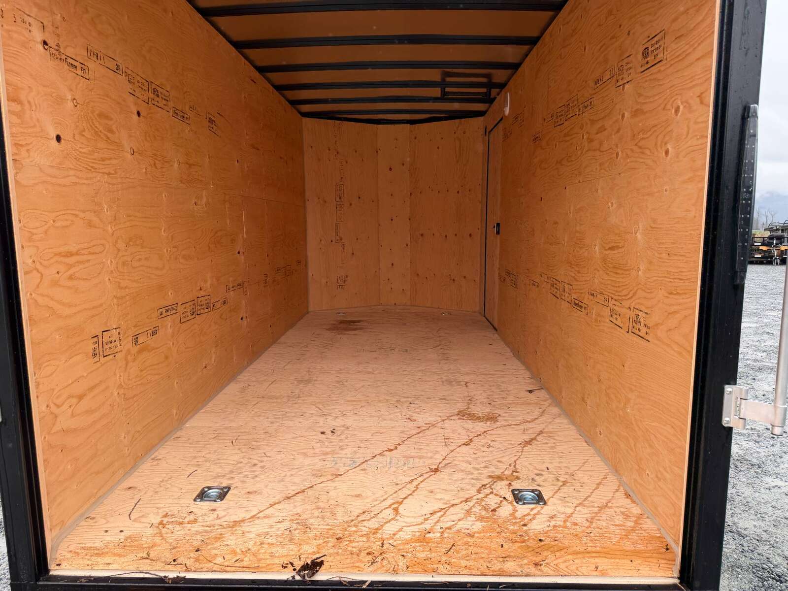 Photo of Pre Owned Used 2026 Royal 7x16 Enclosed Cargo Trailer V Nose Ramp Door Black 7700lb GVW Extra Height