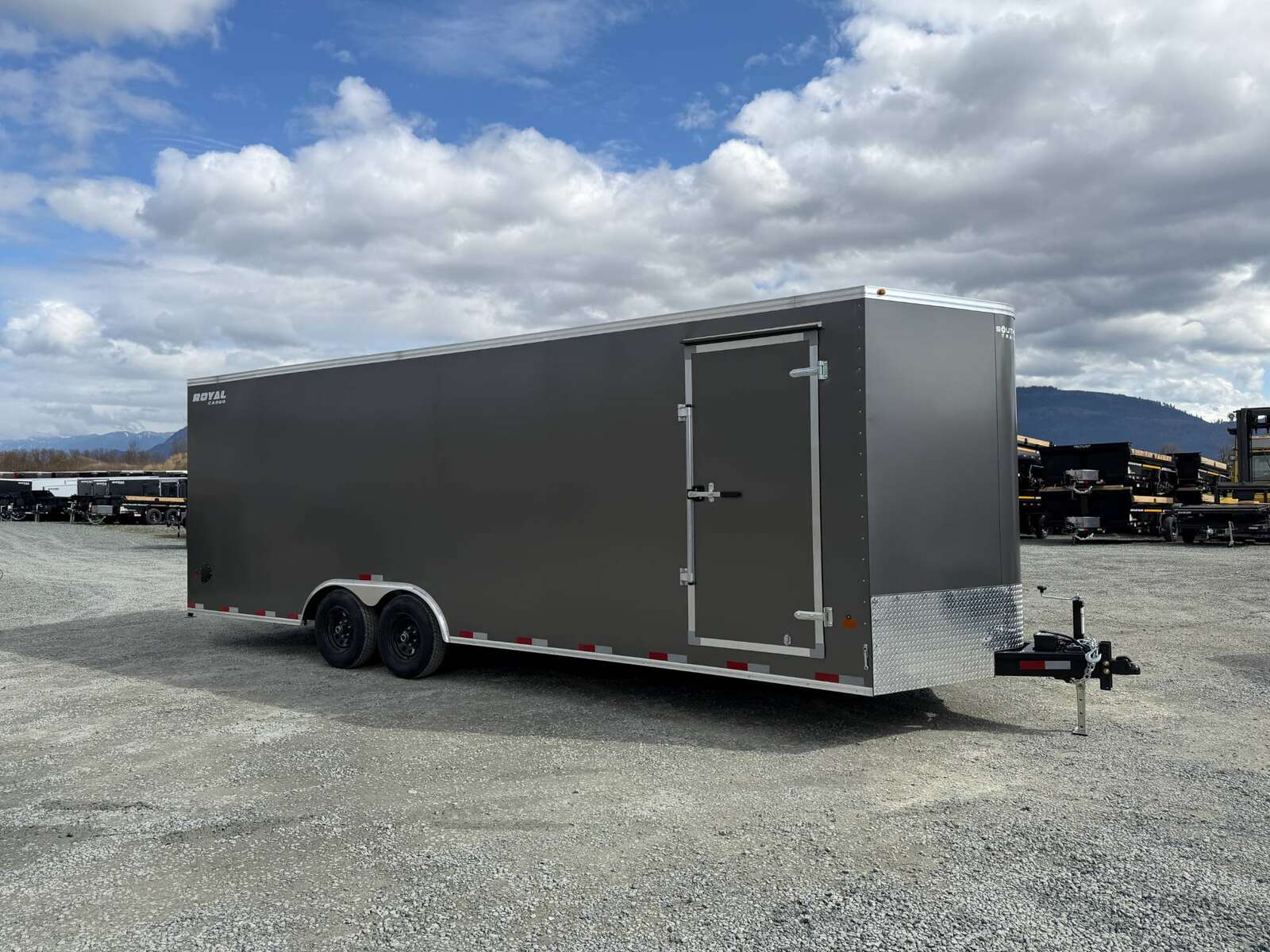 Photo of **SCRATCH SALE** 2026 Royal Cargo 8.5x24 V Nose Car Hauler Cargo / Enclosed Trailer 11,400lb GVW Charcoal Grey Ramp Door Extra Height (GSR)