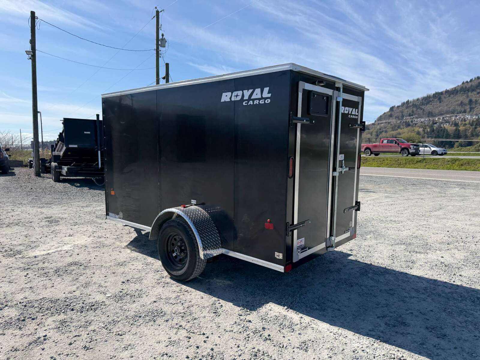 Photo of 2026 Royal Cargo 5x10 Cargo Enclosed Trailer V Nose Barn Doors Black