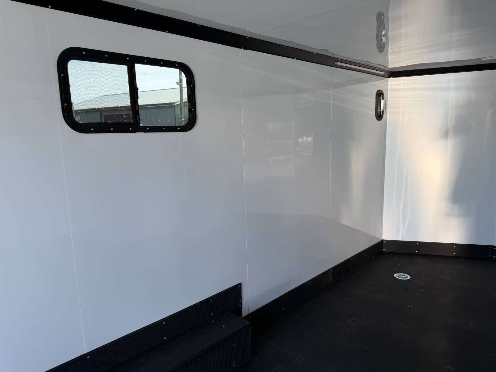 Photo of 2026 Royal 8.5x20 V Nose Cargo Enclosed Trailer Camping Package Blue w/ Blackout Pkg, Insulated, Ramp Door, White Walls, 2x Windows & More!