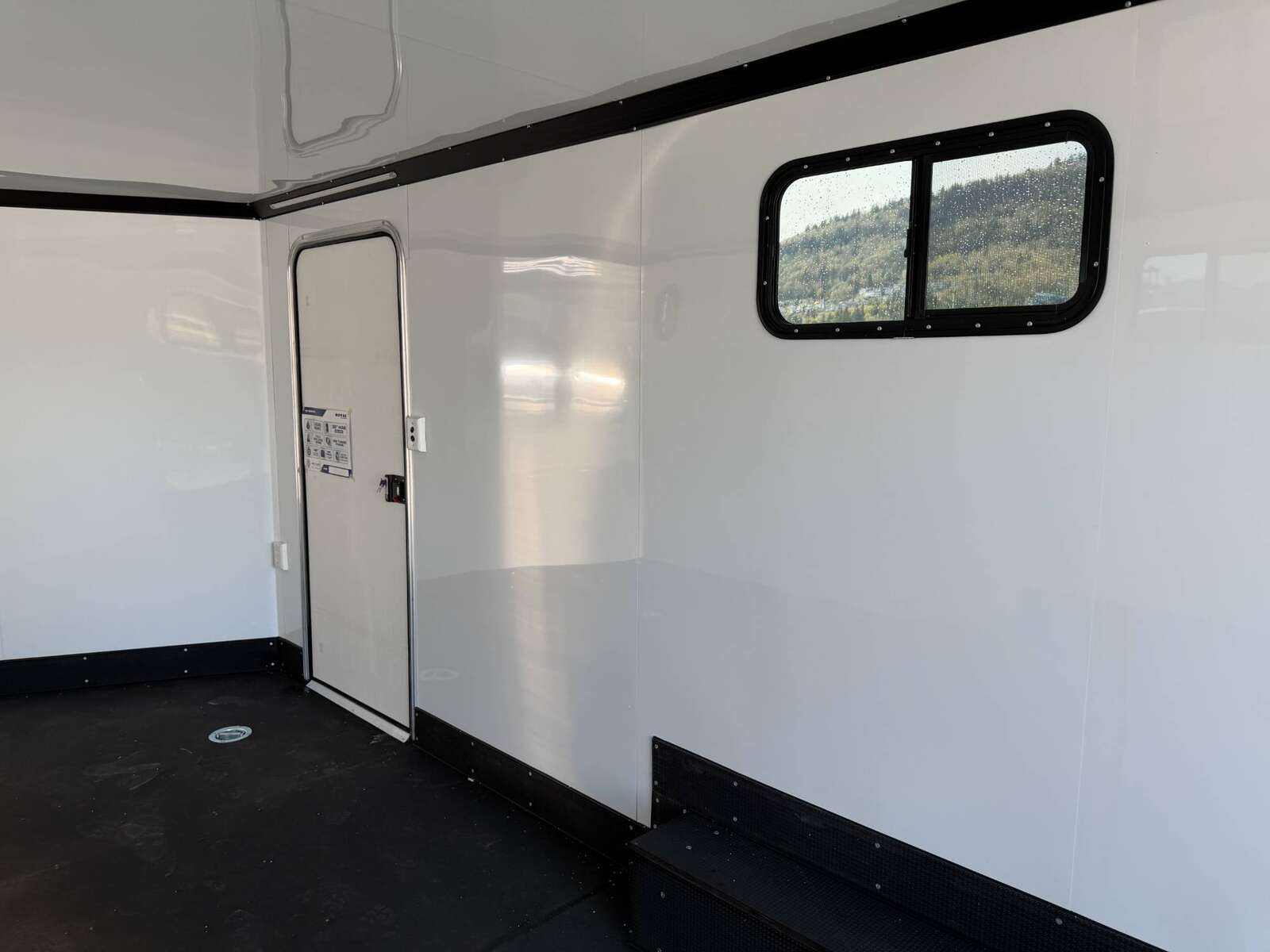 Photo of 2026 Royal 8.5x20 V Nose Cargo Enclosed Trailer Camping Package Blue w/ Blackout Pkg, Insulated, Ramp Door, White Walls, 2x Windows & More!