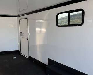 Thumbnail Photo of 2026 Royal 8.5x20 V Nose Cargo Enclosed Trailer Camping Package Blue w/ Blackout Pkg, Insulated, Ramp Door, White Walls, 2x Windows & More!