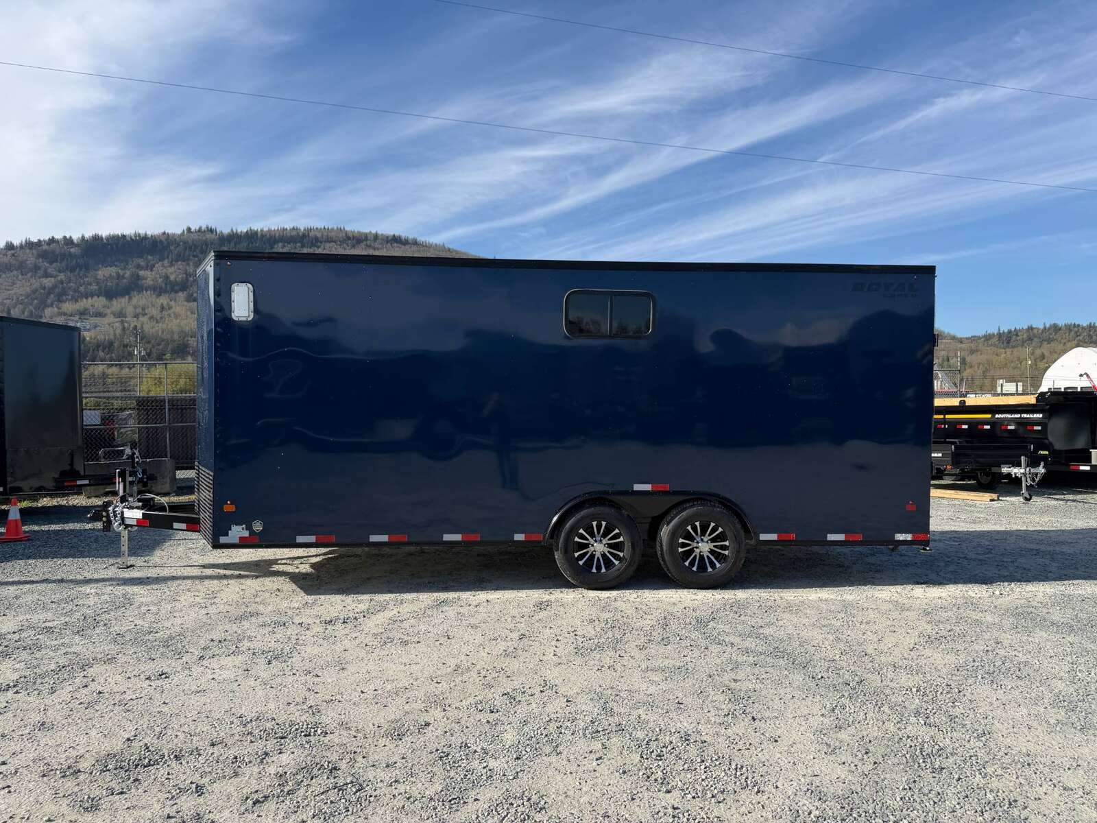 Photo of 2026 Royal 8.5x20 V Nose Cargo Enclosed Trailer Camping Package Blue w/ Blackout Pkg, Insulated, Ramp Door, White Walls, 2x Windows & More!