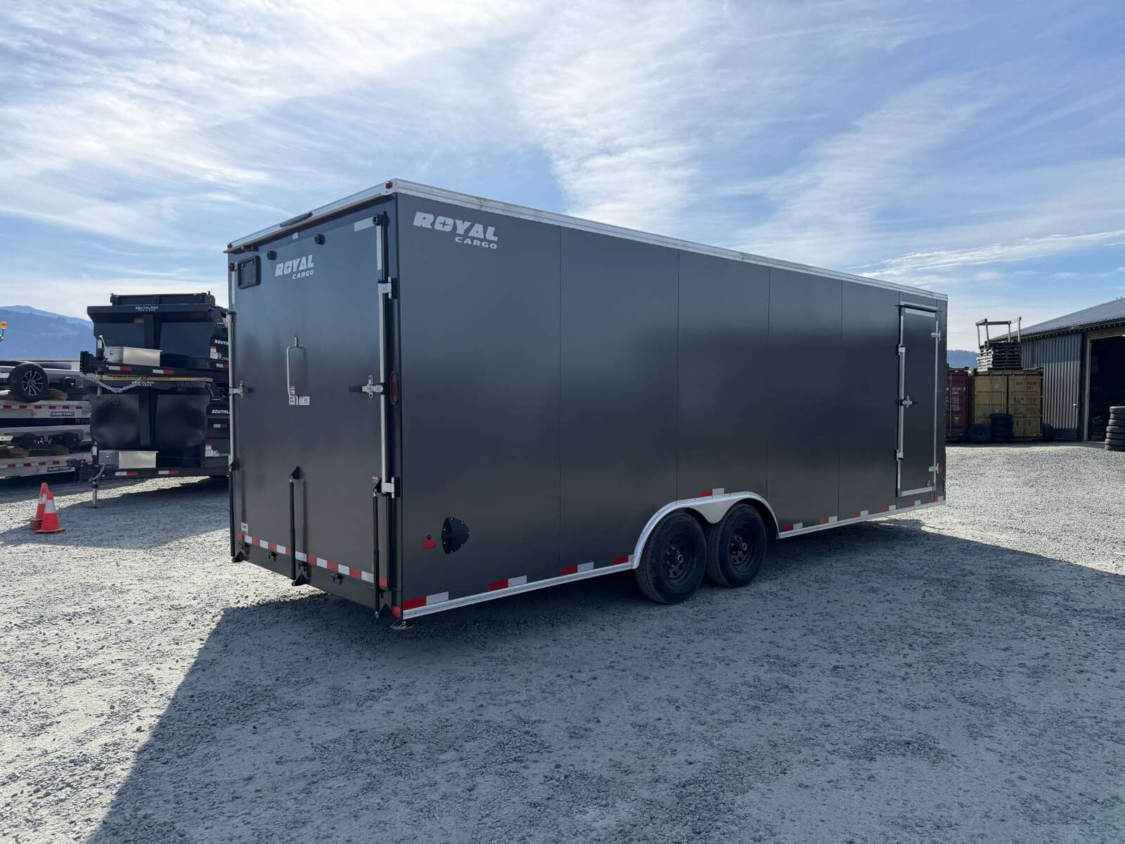 Photo of 2026 Royal Cargo 8.5x24 V Nose Car Hauler Cargo / Enclosed Trailer w/ Side Escape Door 11,400lb GVW Charcoal Grey Ramp Door Extra Height