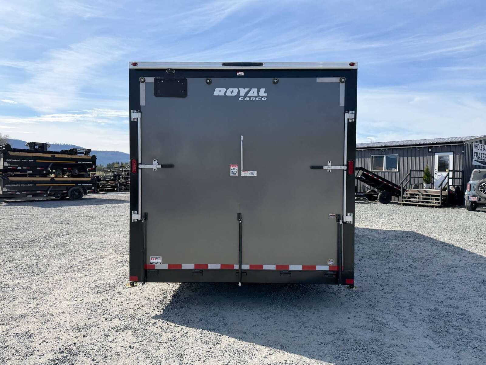 Photo of 2026 Royal Cargo 8.5x24 V Nose Car Hauler Cargo / Enclosed Trailer w/ Side Escape Door 11,400lb GVW Charcoal Grey Ramp Door Extra Height
