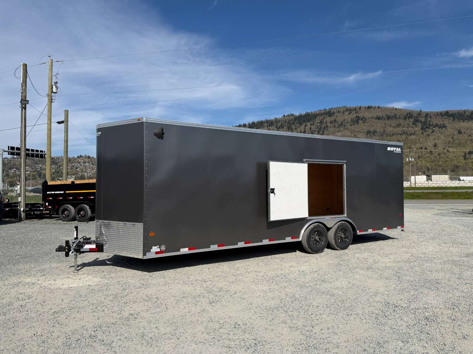 Photo of 2026 Royal Cargo 8.5x24 V Nose Car Hauler Cargo / Enclosed Trailer w/ Side Escape Door 11,400lb GVW Charcoal Grey Ramp Door Extra Height