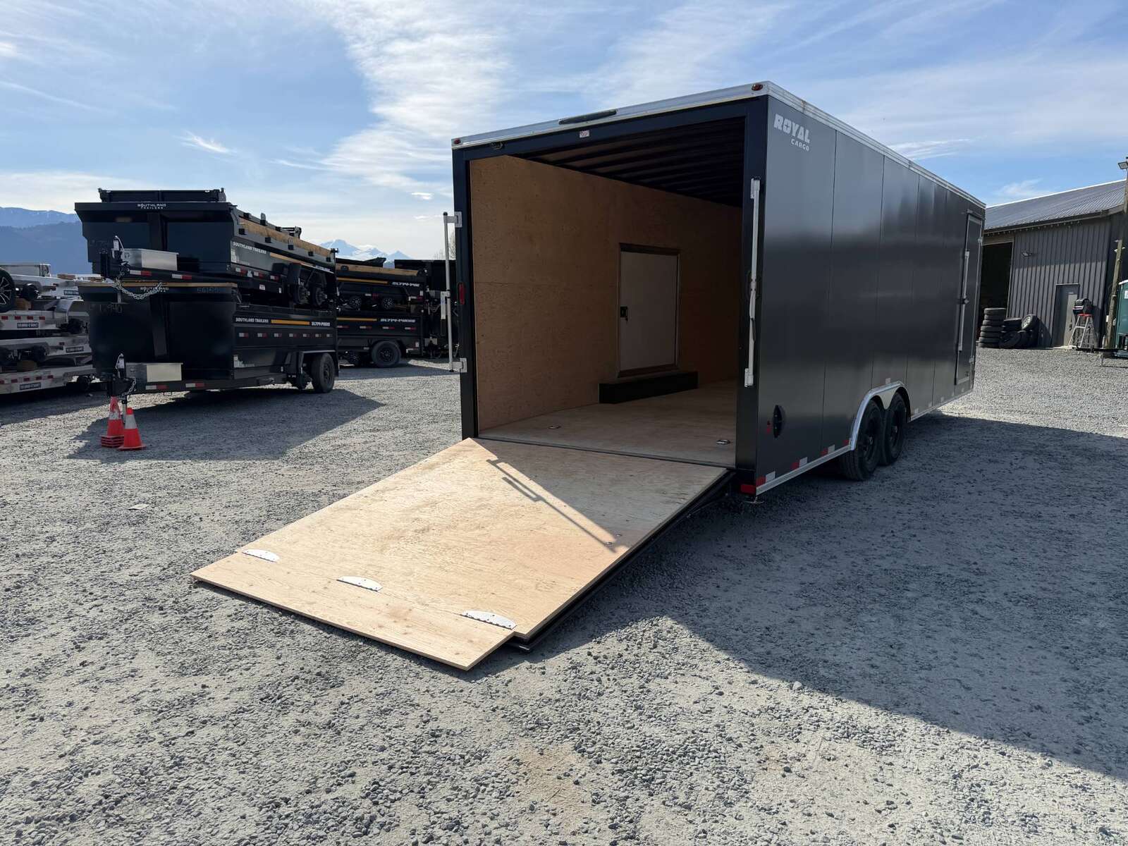 Photo of 2026 Royal Cargo 8.5x24 V Nose Car Hauler Cargo / Enclosed Trailer w/ Side Escape Door 11,400lb GVW Charcoal Grey Ramp Door Extra Height