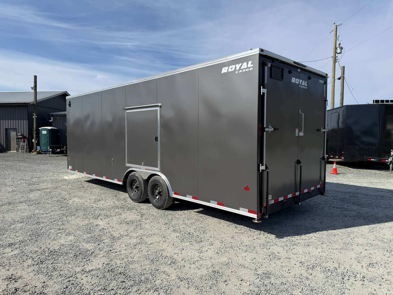 Photo of 2026 Royal Cargo 8.5x24 V Nose Car Hauler Cargo / Enclosed Trailer w/ Side Escape Door 11,400lb GVW Charcoal Grey Ramp Door Extra Height