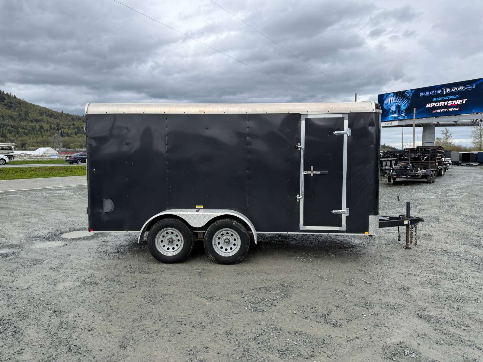 Photo of Pre Owned Used 2017 TNT 7x14 Cargo Enclosed Trailer 5000lbs GVW Black w/ Rear Barn Doors