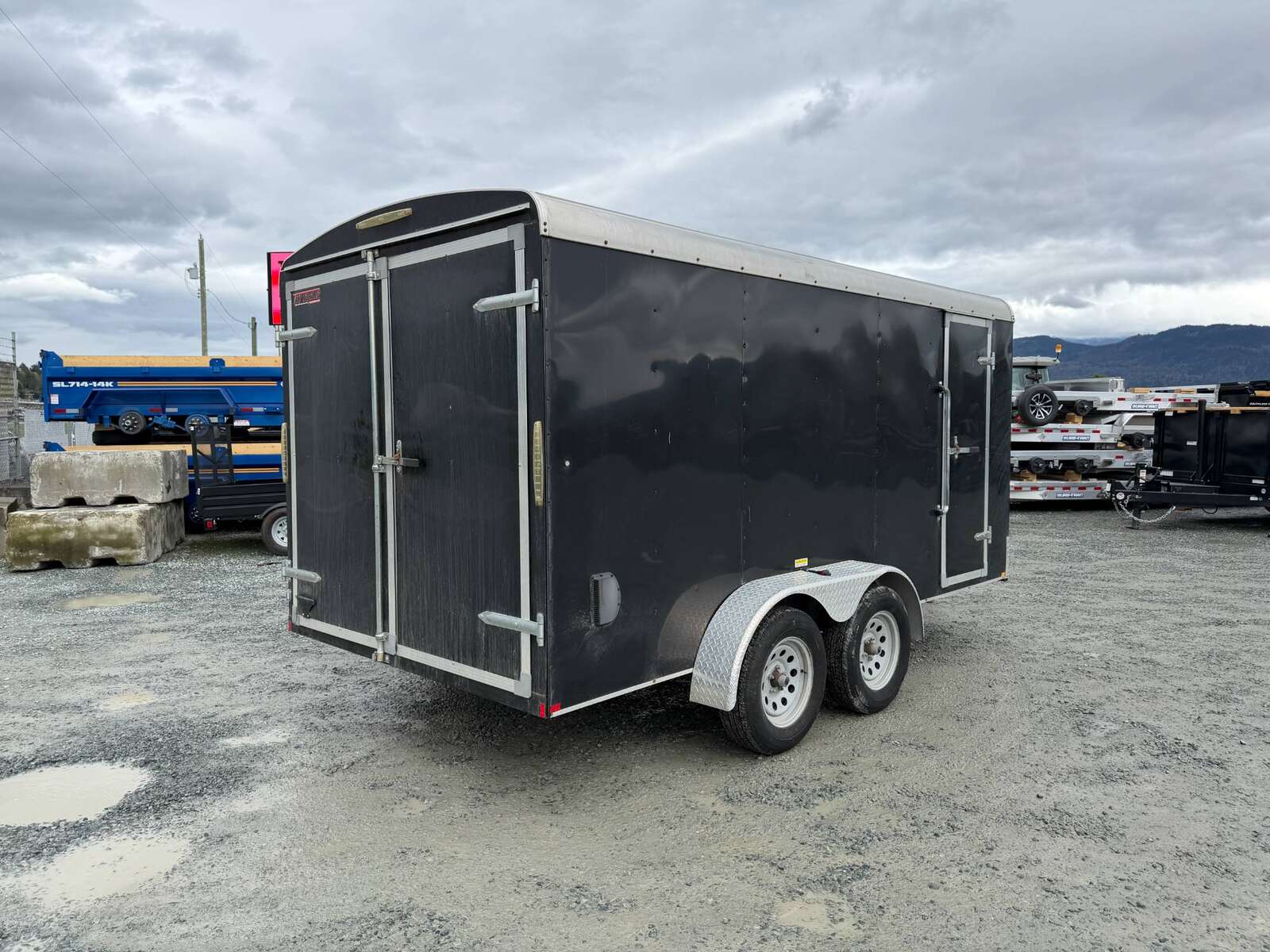 Photo of Pre Owned Used 2017 TNT 7x14 Cargo Enclosed Trailer 5000lbs GVW Black w/ Rear Barn Doors