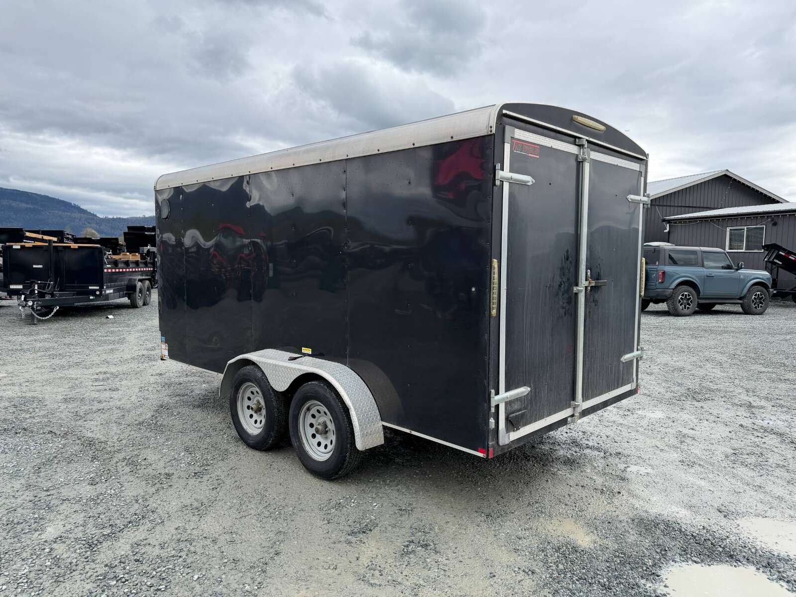Photo of Pre Owned Used 2017 TNT 7x14 Cargo Enclosed Trailer 5000lbs GVW Black w/ Rear Barn Doors