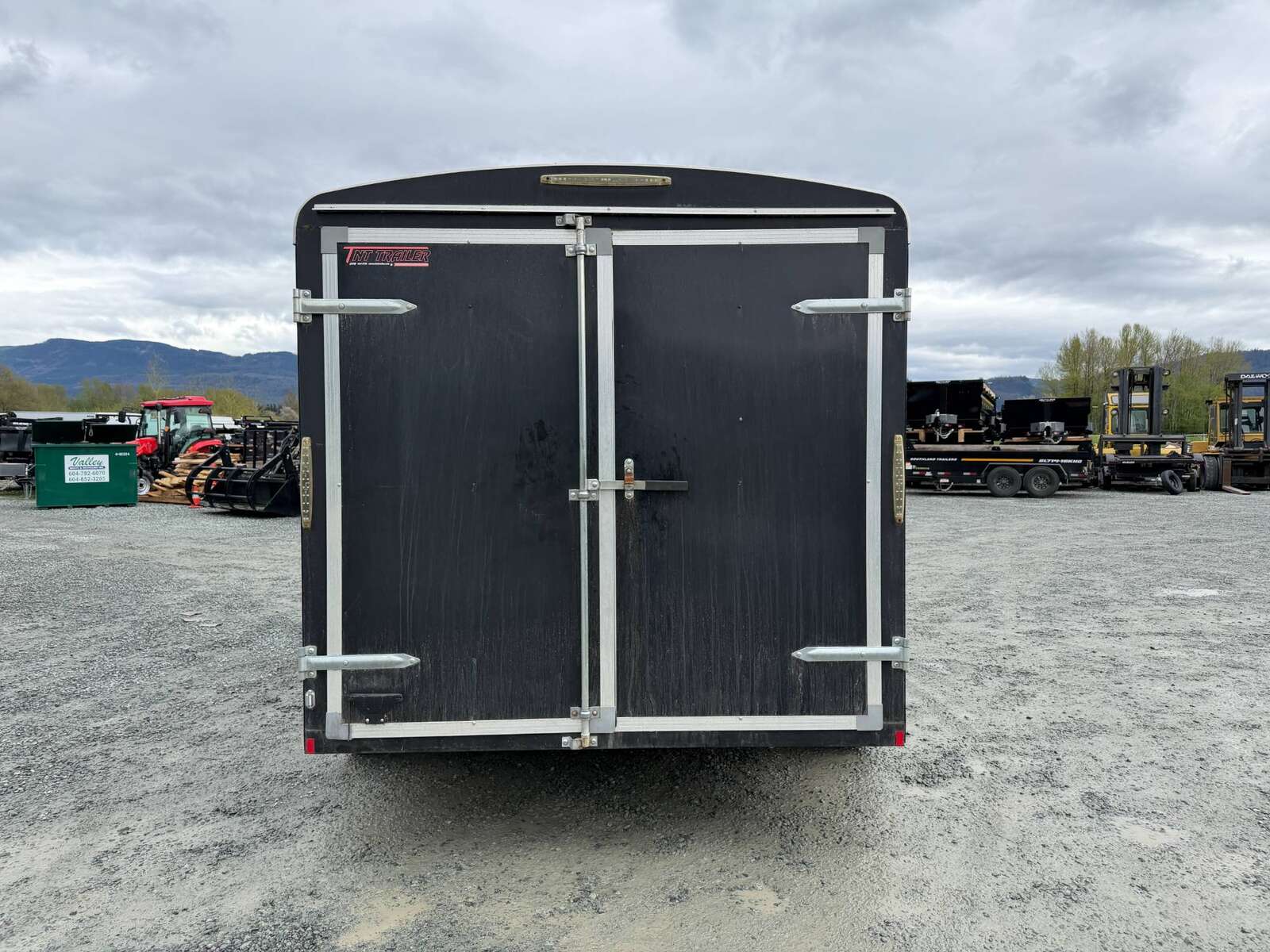 Photo of Pre Owned Used 2017 TNT 7x14 Cargo Enclosed Trailer 5000lbs GVW Black w/ Rear Barn Doors